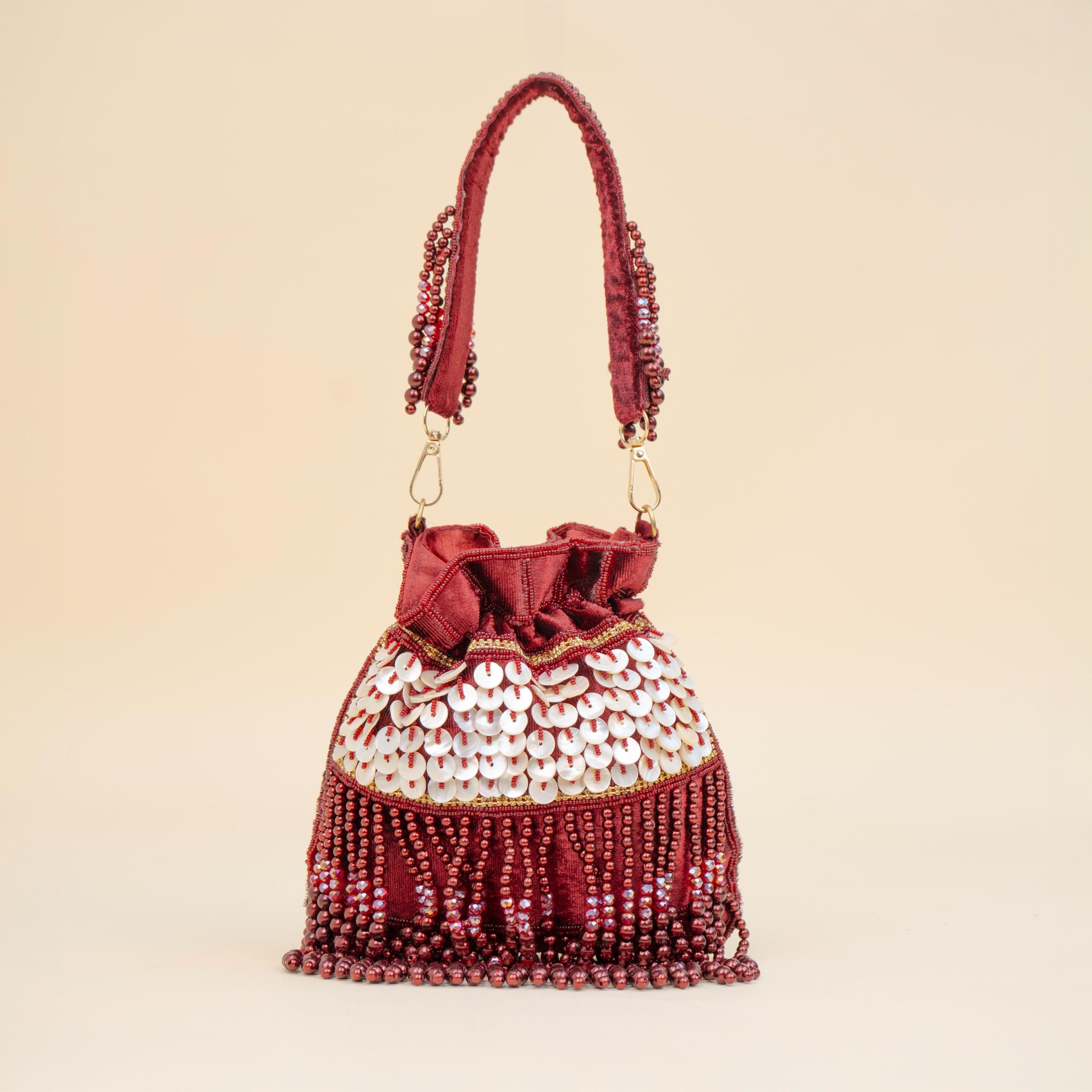 Royal Tassel Sequin Potli