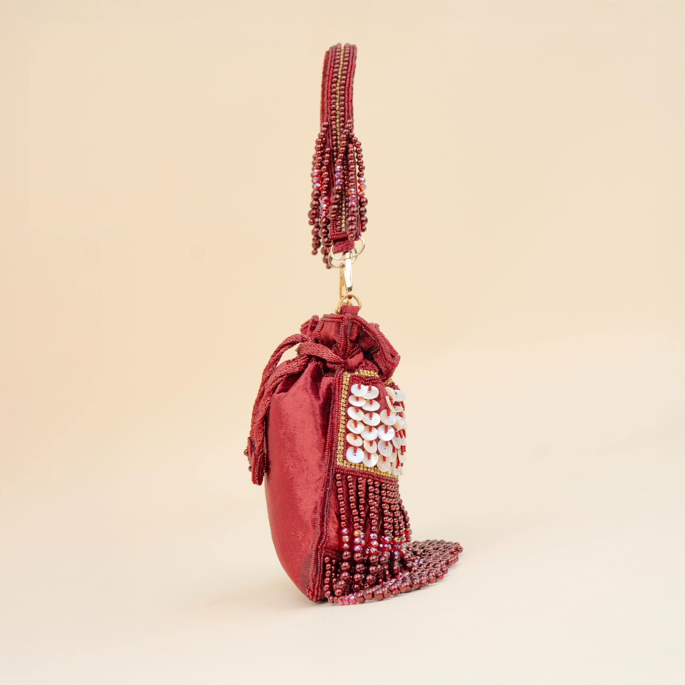 Royal Tassel Sequin Potli