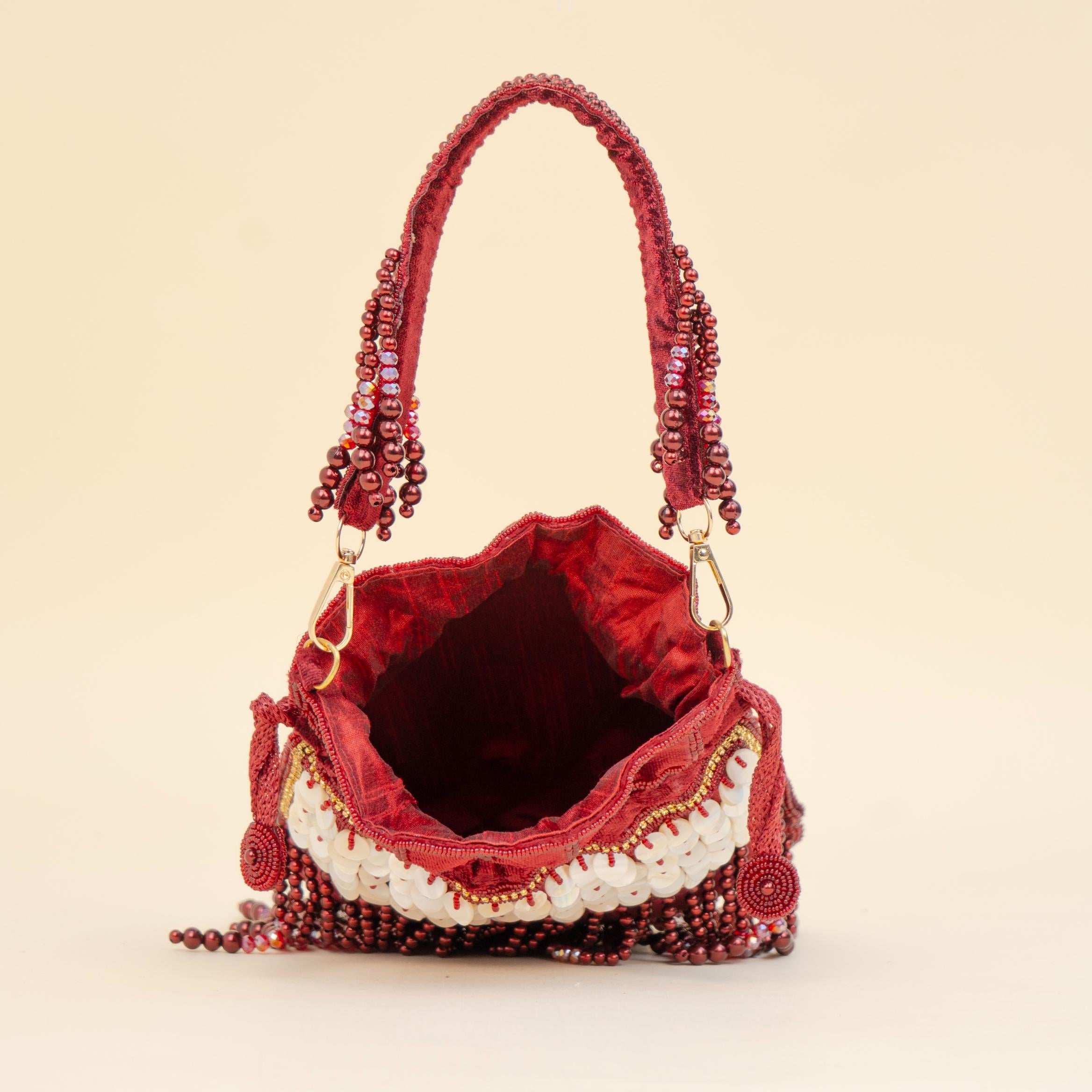 Royal Tassel Sequin Potli