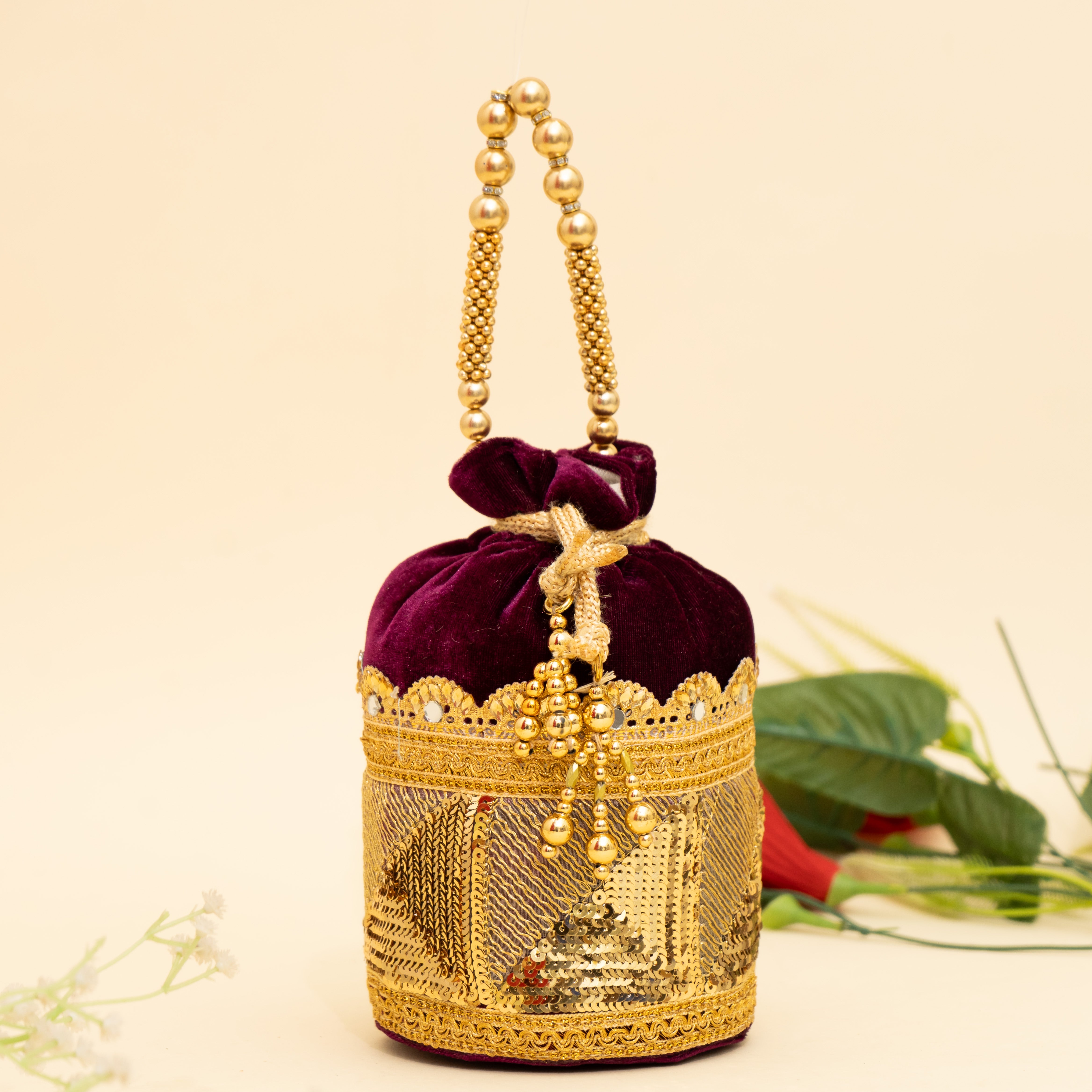 Wine Golden Gleam potli | cara