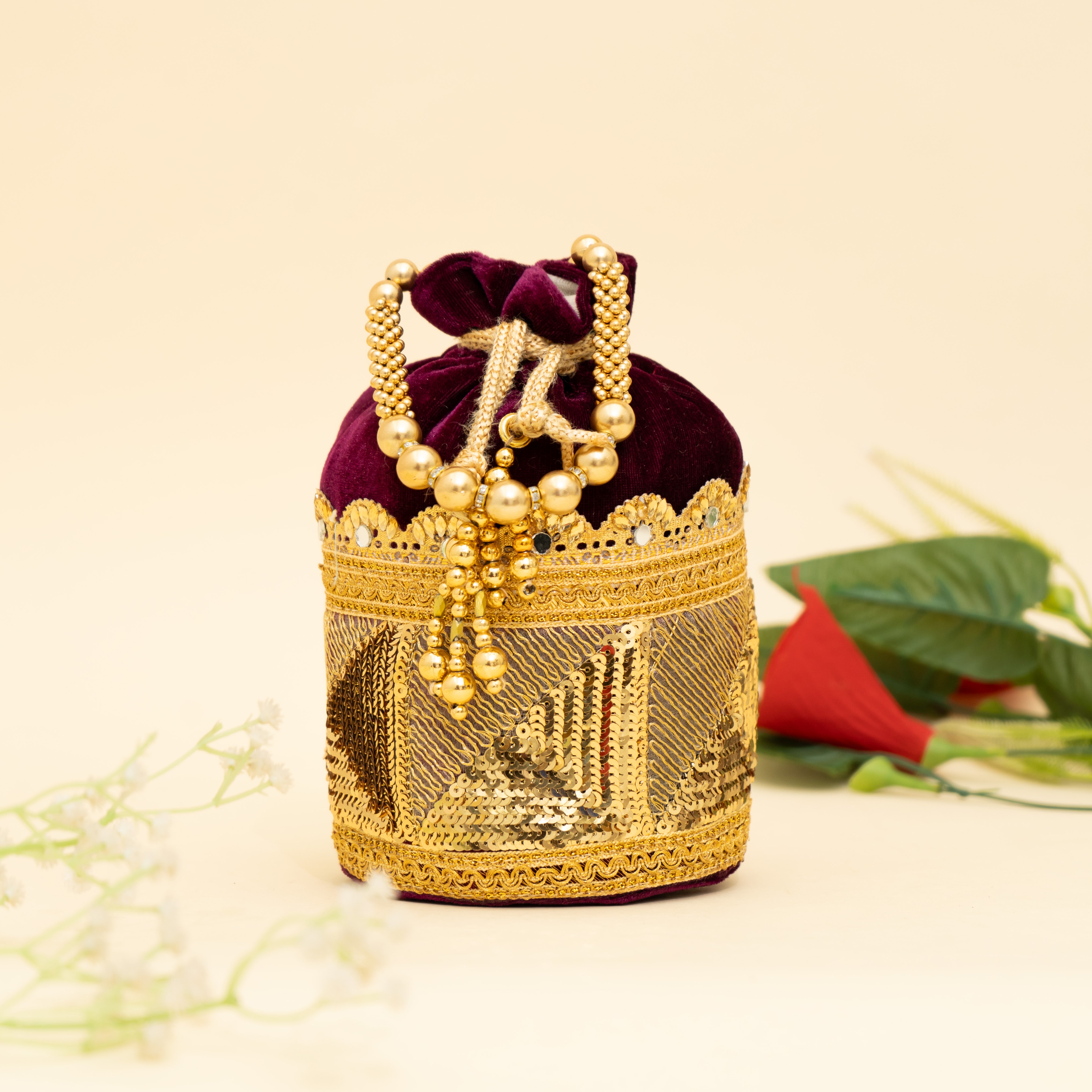 Wine Golden Gleam potli | cara