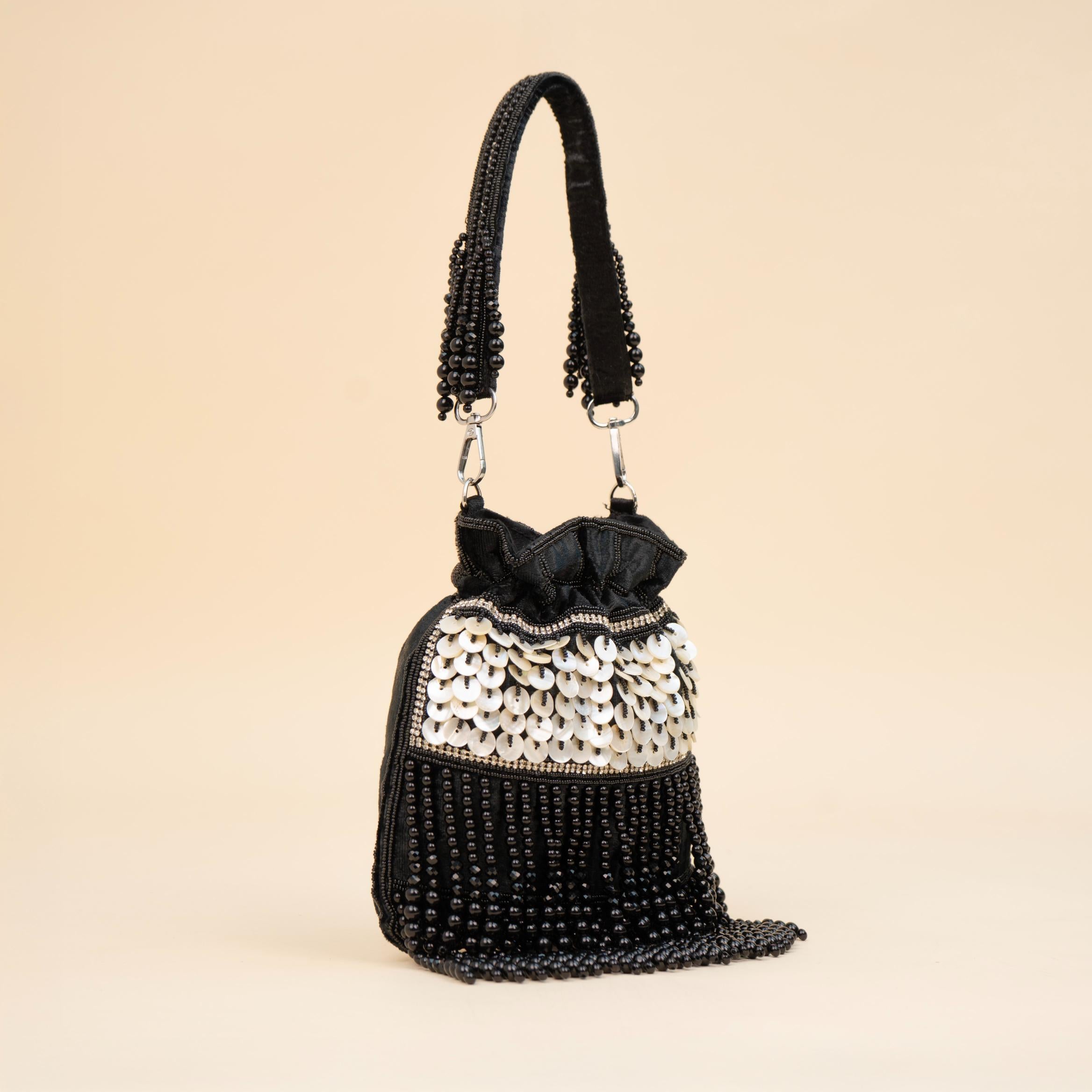 Royal Tassel Sequin Potli