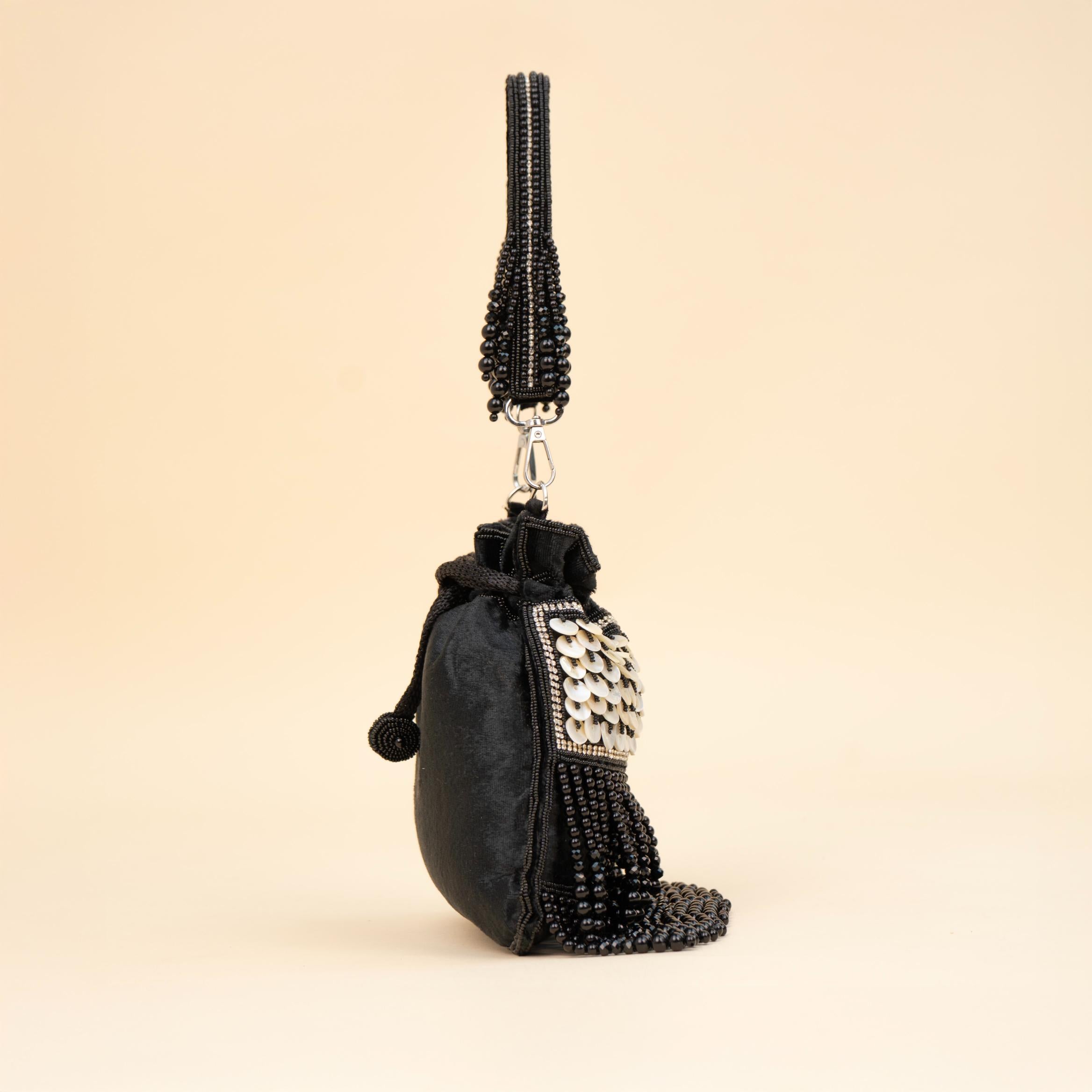 Royal Tassel Sequin Potli