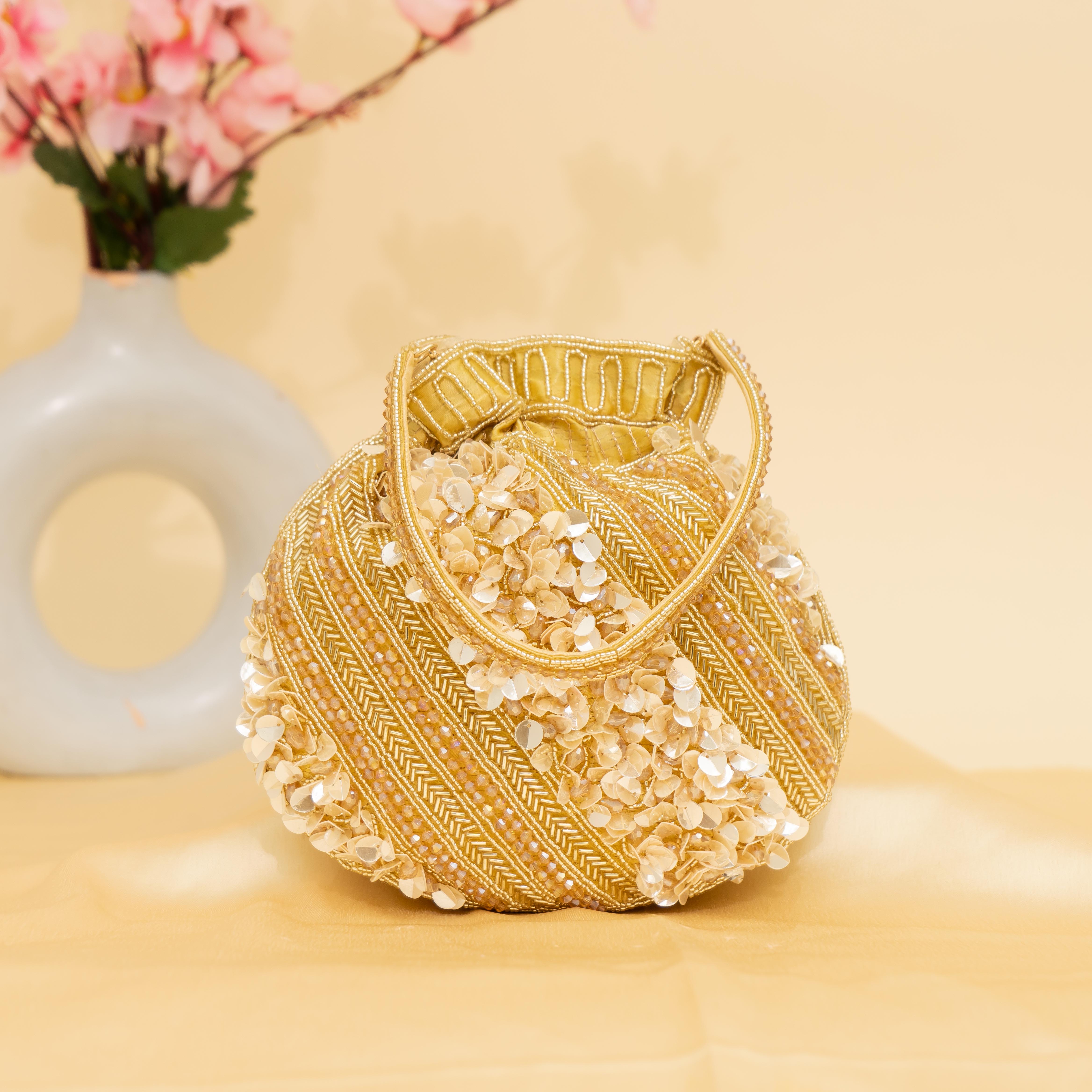 gold Celestial Oyster potli | cara