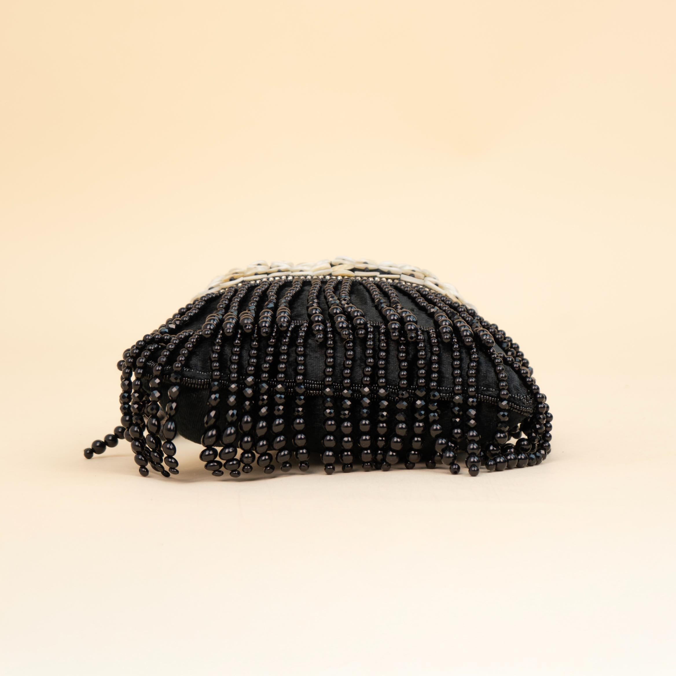 Royal Tassel Sequin Potli