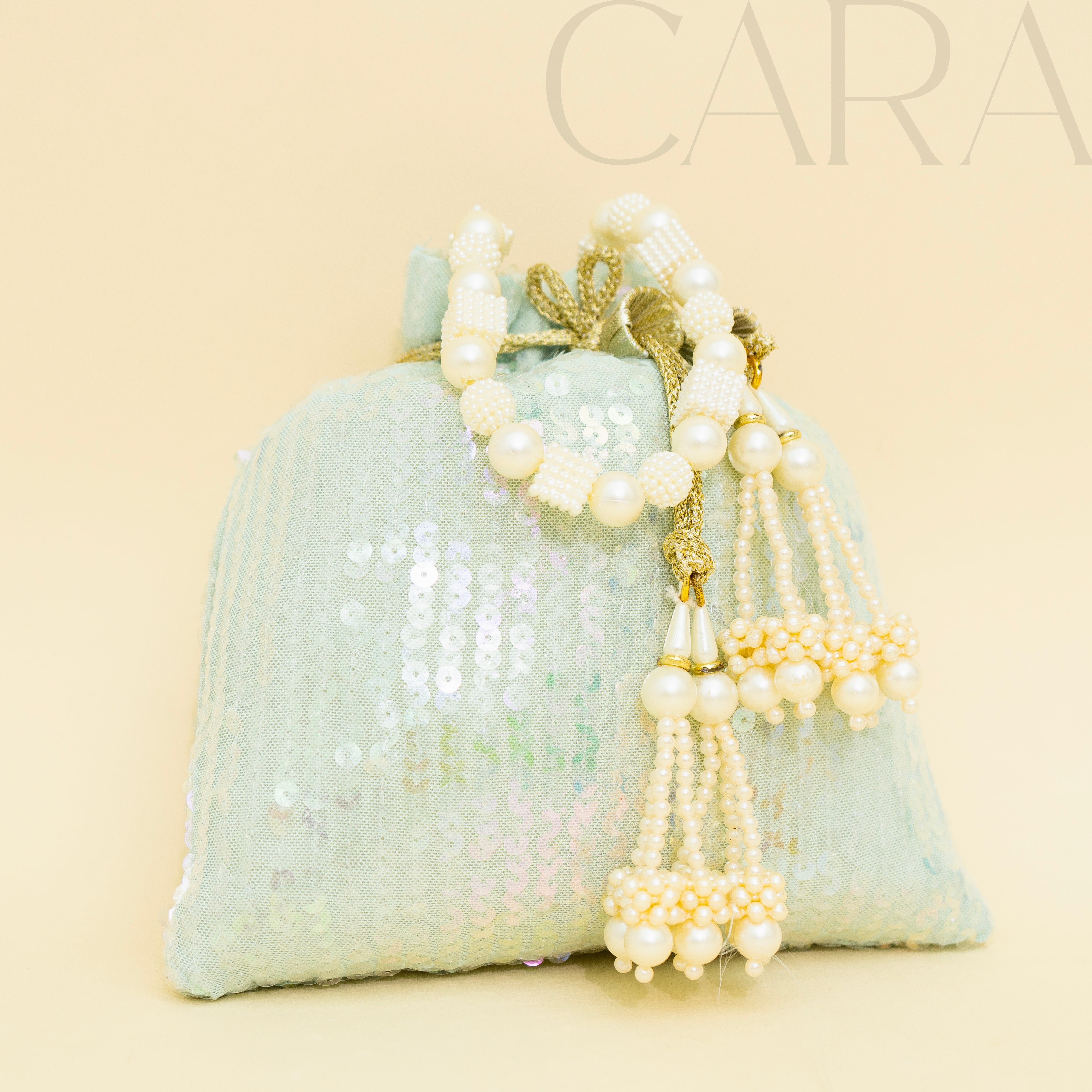 Sequence Green Potli | Cara