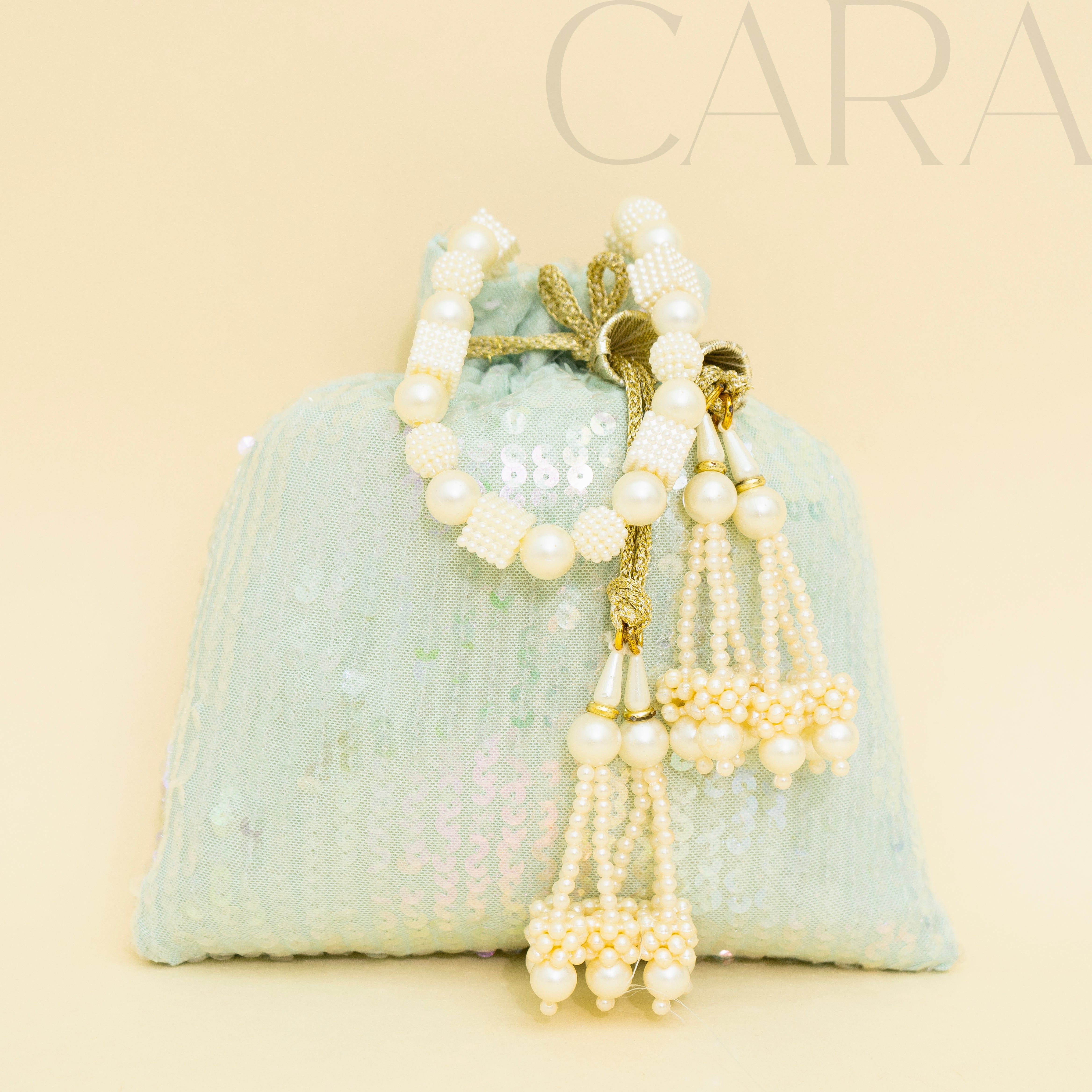 Sequence Green Potli | Cara