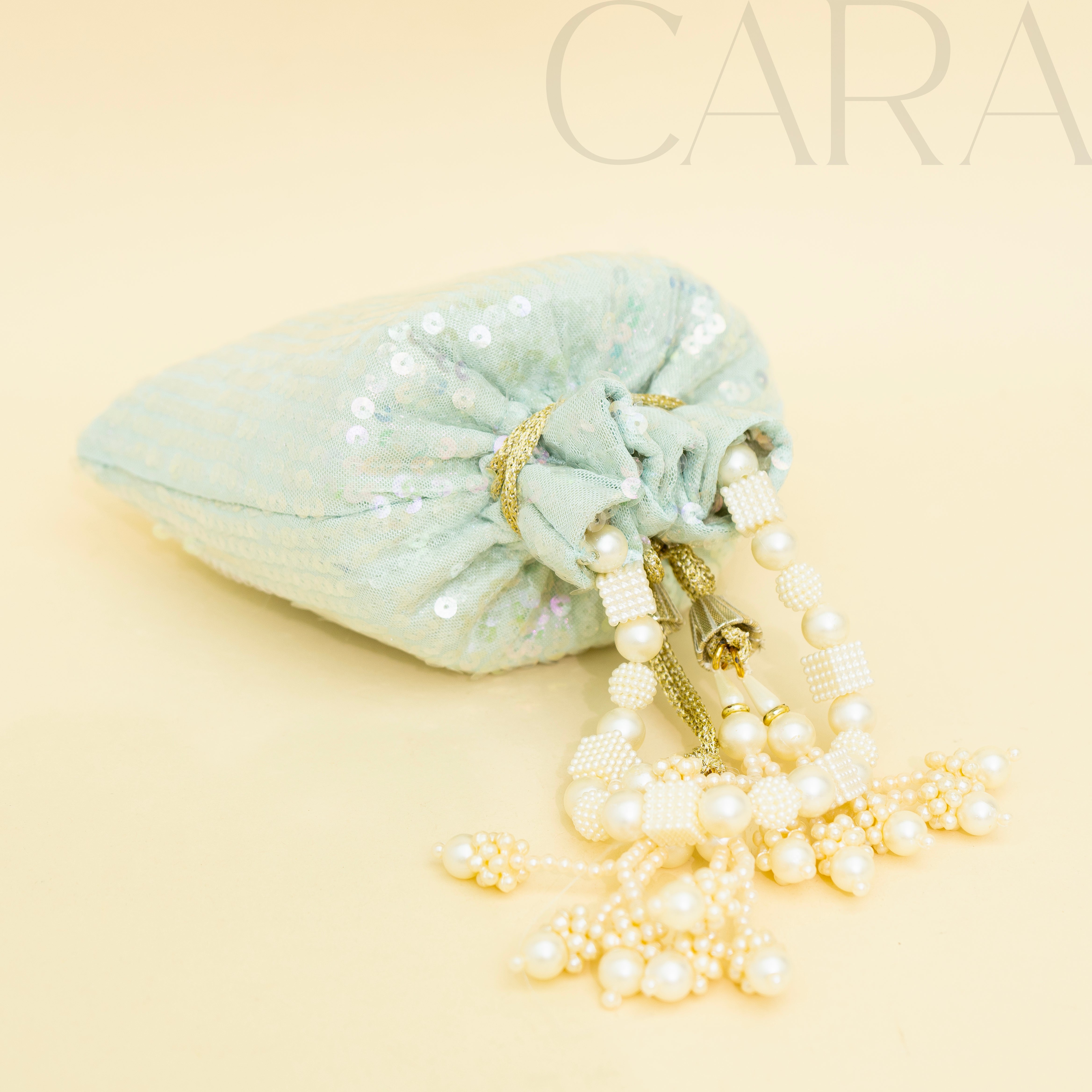 Sequence Green Potli | Cara