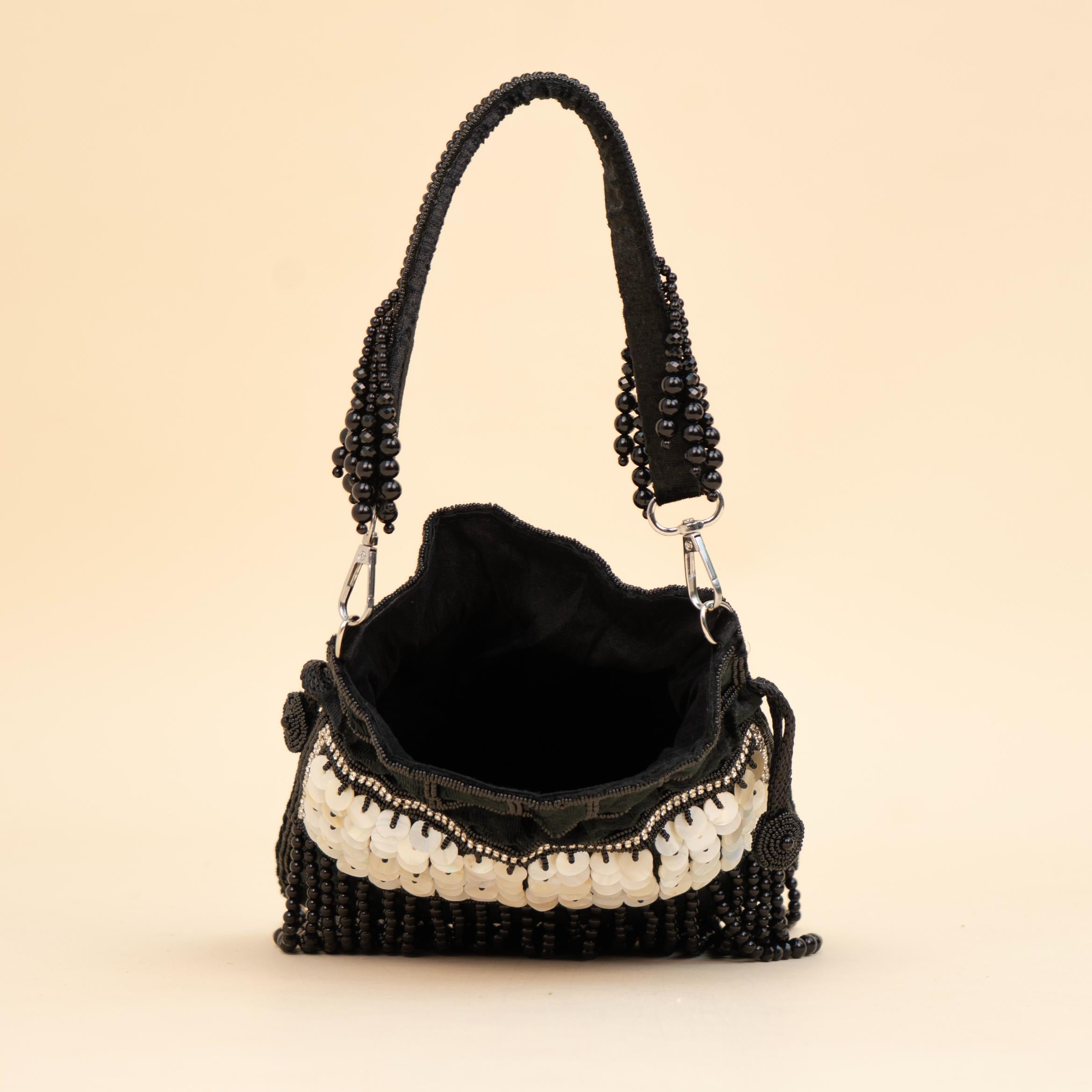 Royal Tassel Sequin Potli