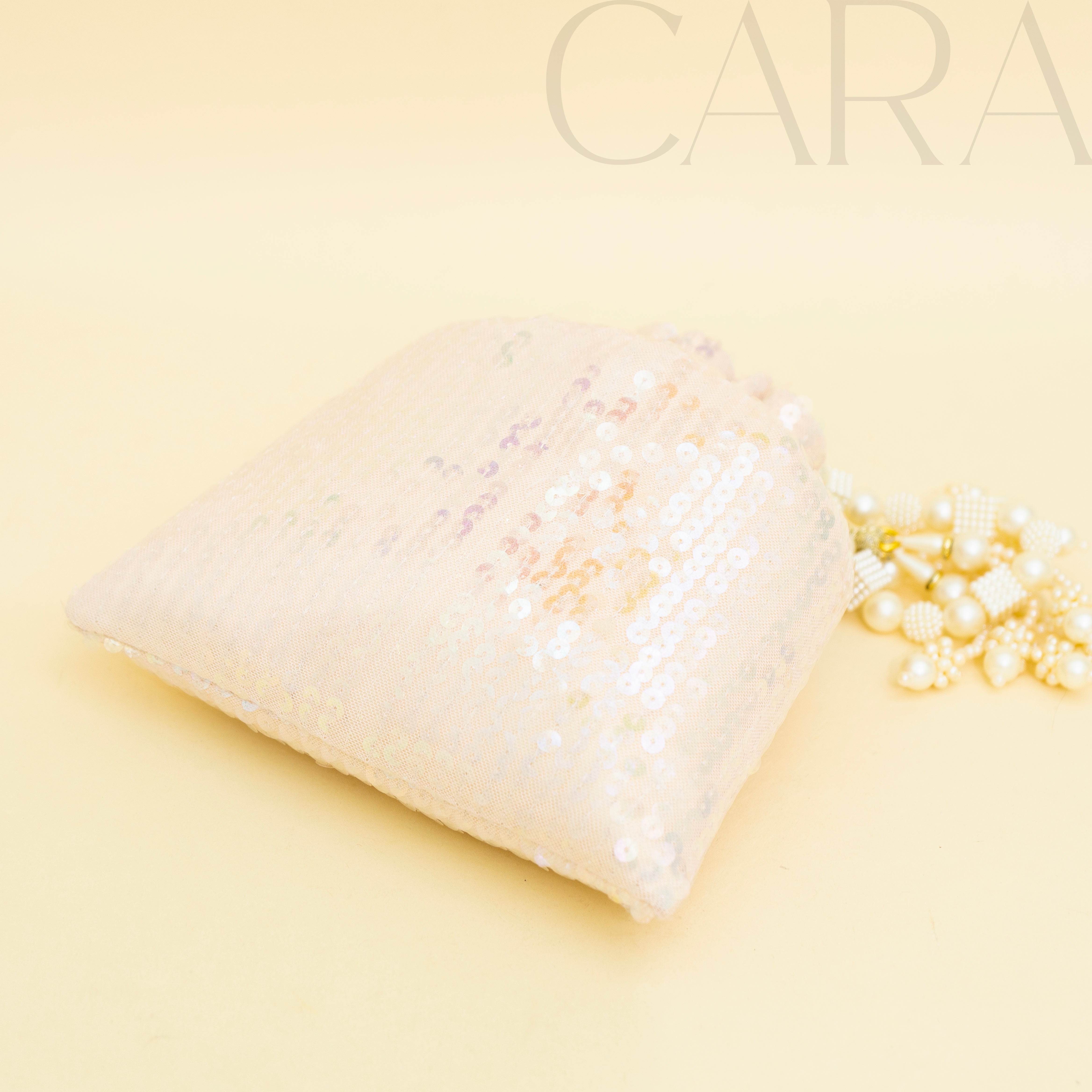 Sequence Peach Potli | Cara