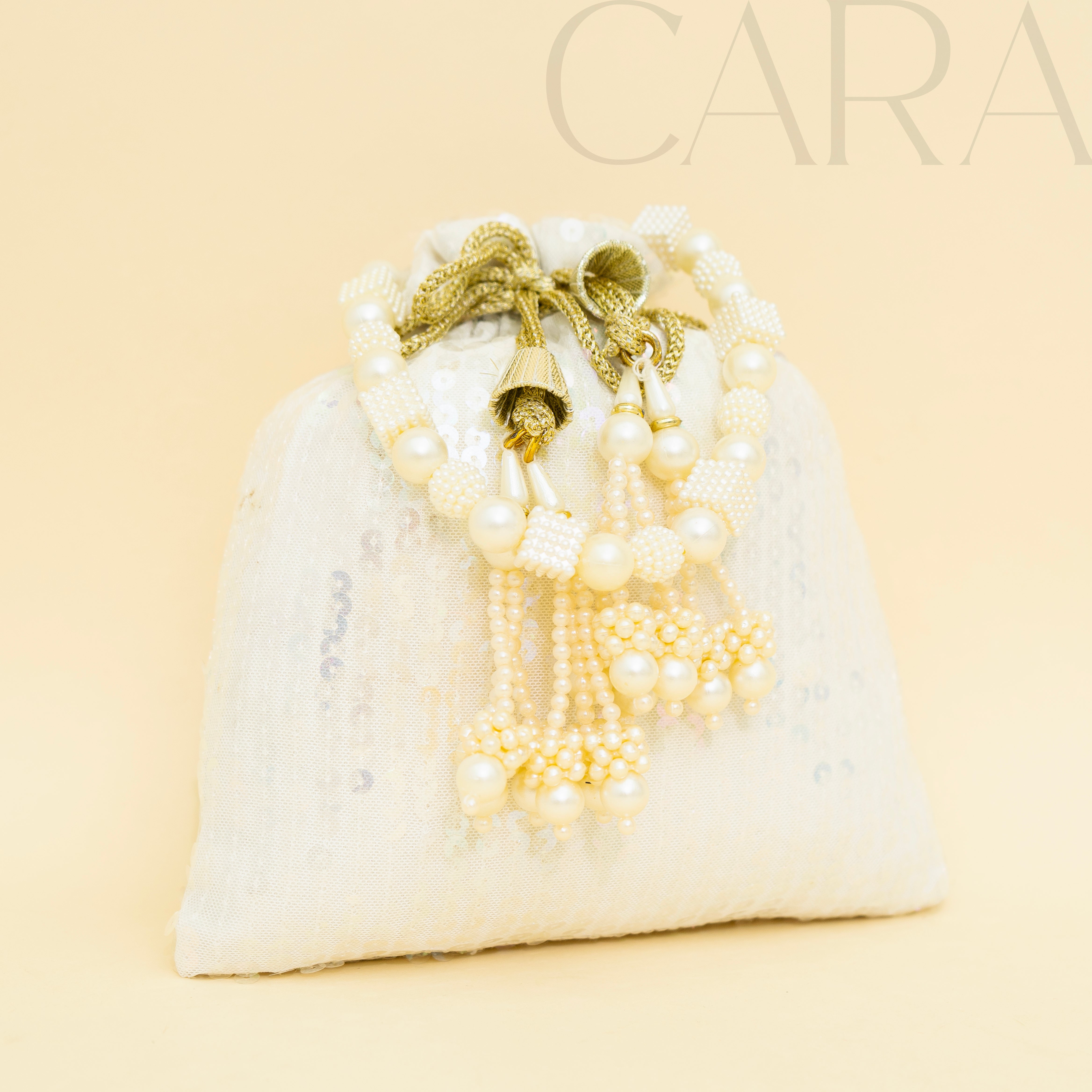 Sequence White Potli | Cara