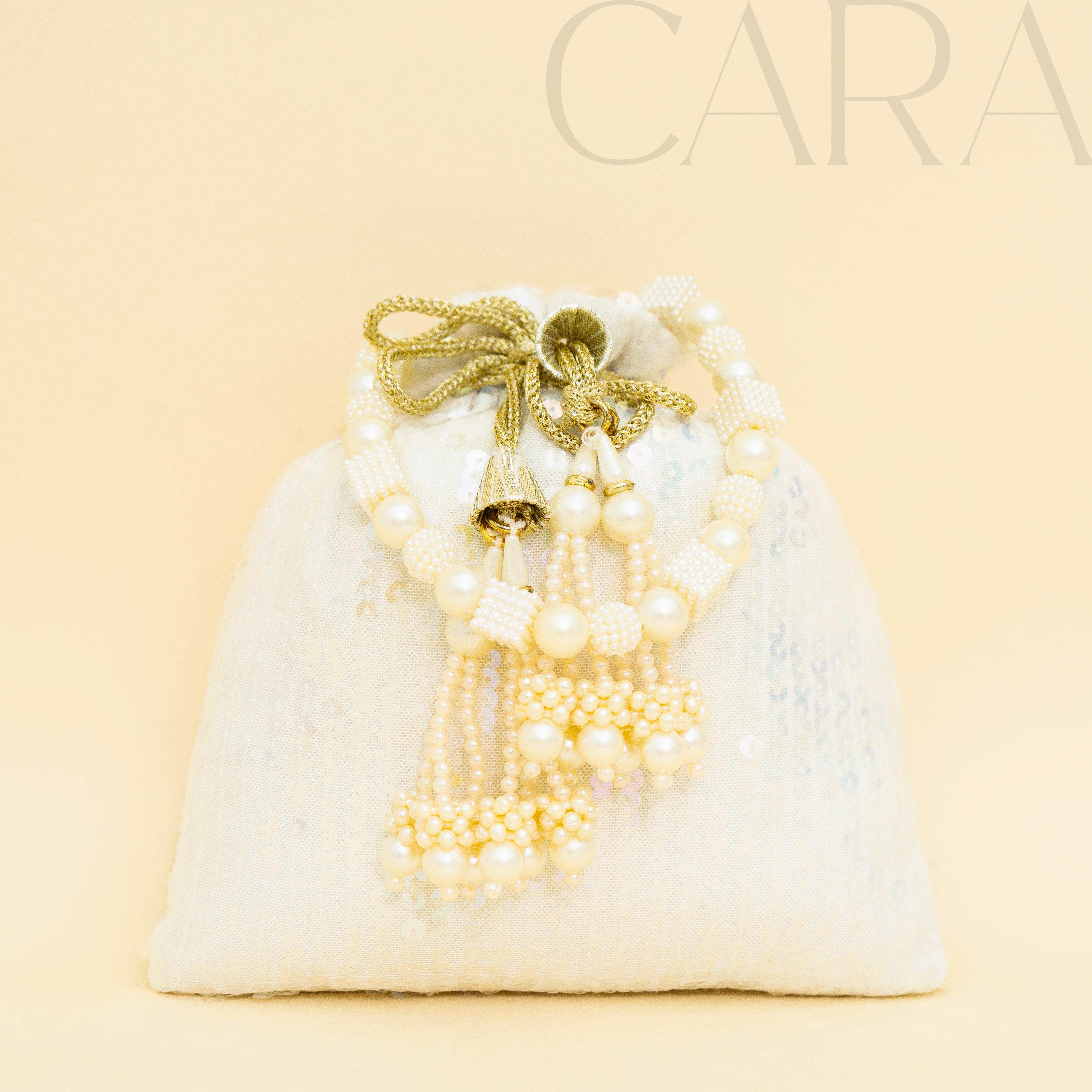 Sequence White Potli | Cara