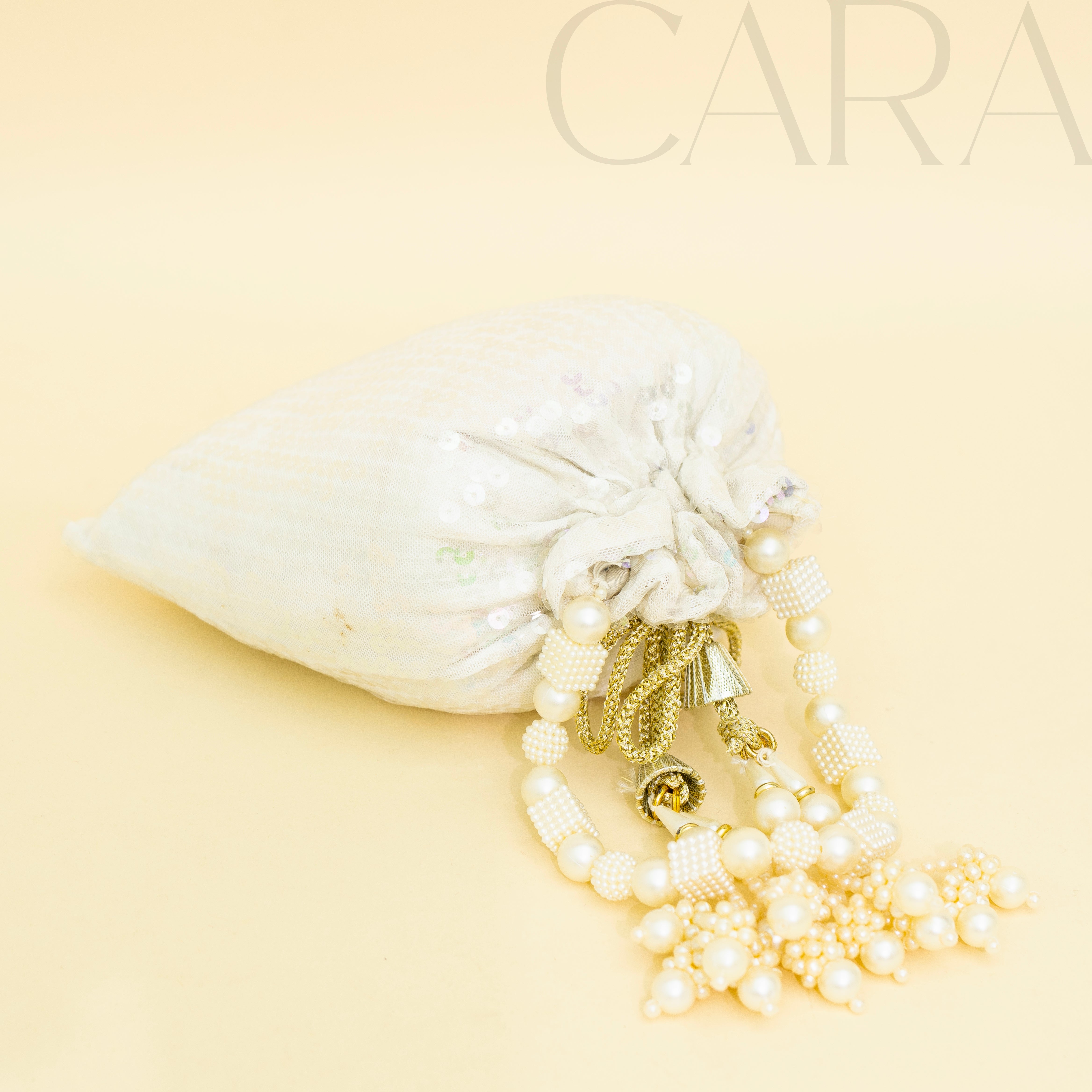 Sequence White Potli | Cara