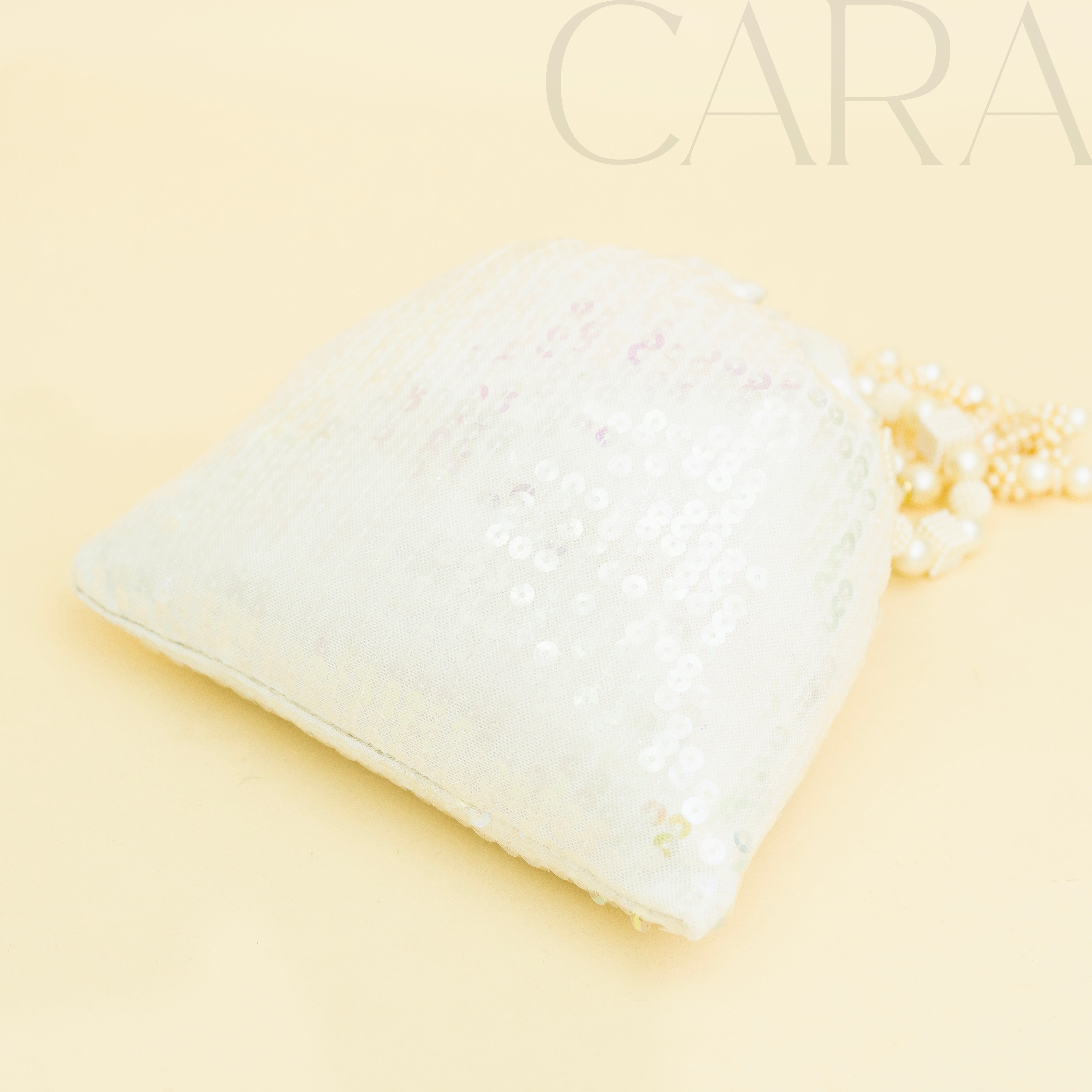 Sequence White Potli | Cara