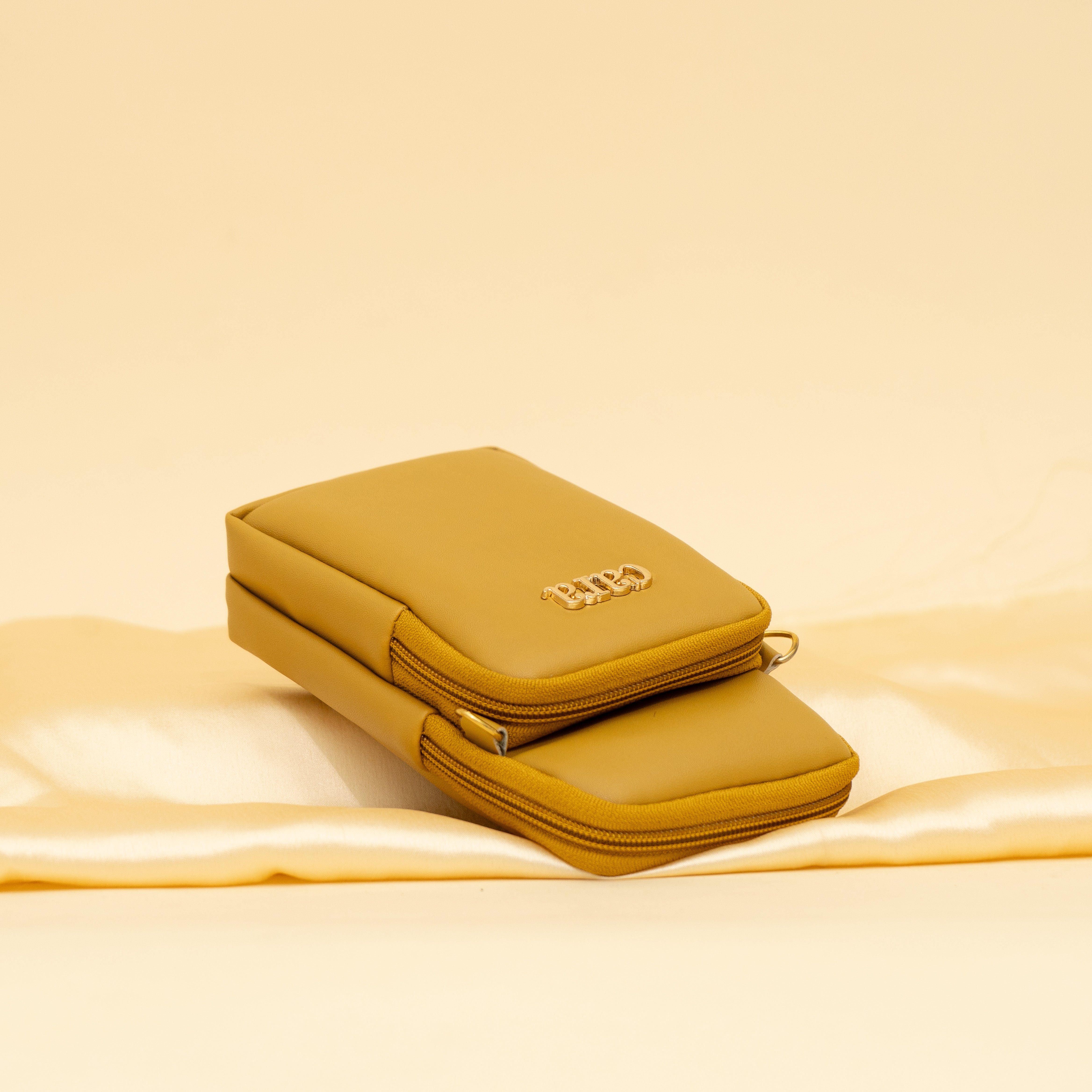 yellow Daily Drip mobile sling| cara