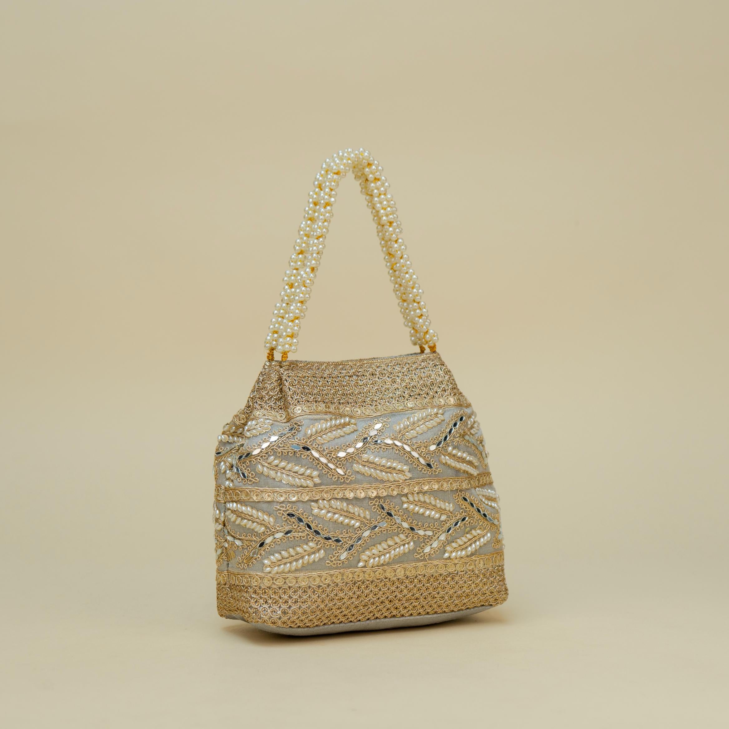 Ornate Handle Potli