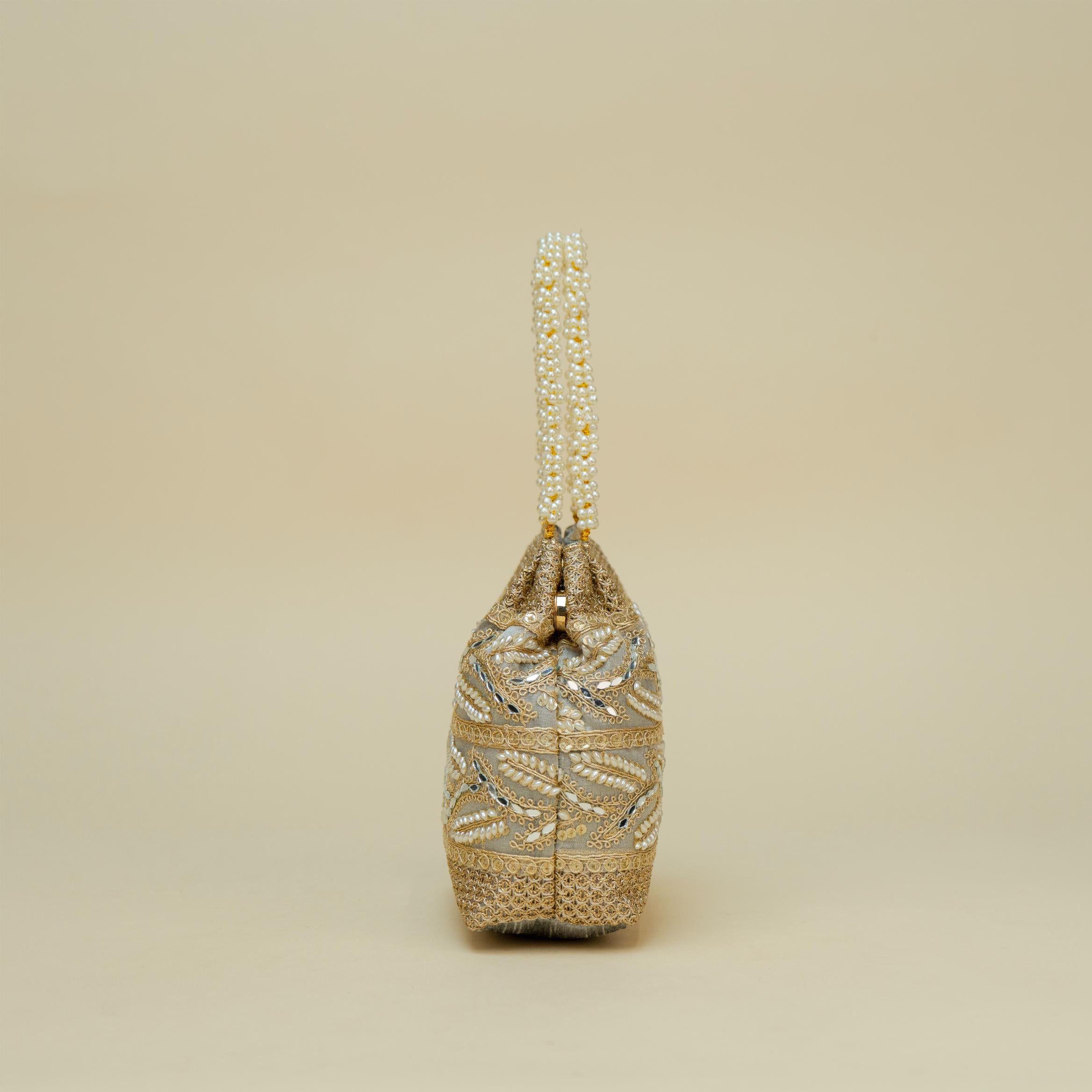 Ornate Handle Potli