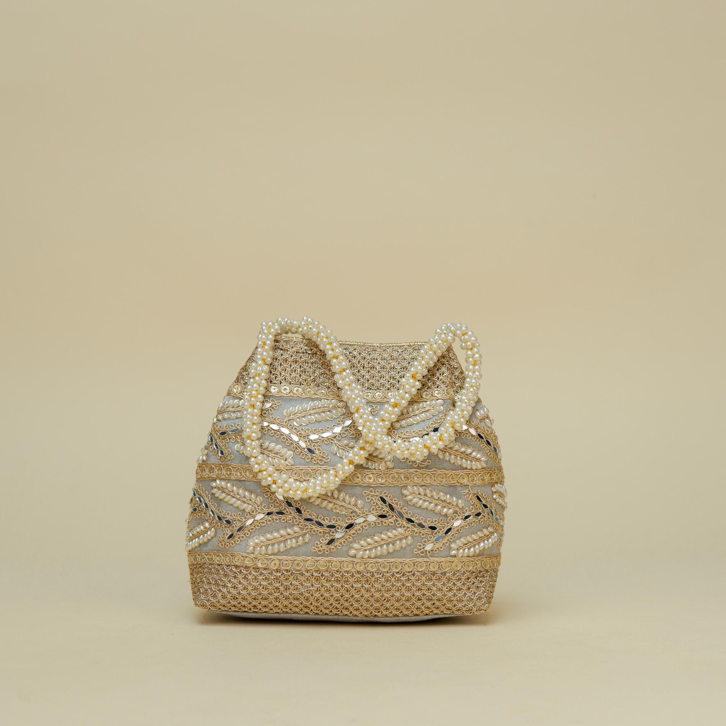 Ornate Handle Potli