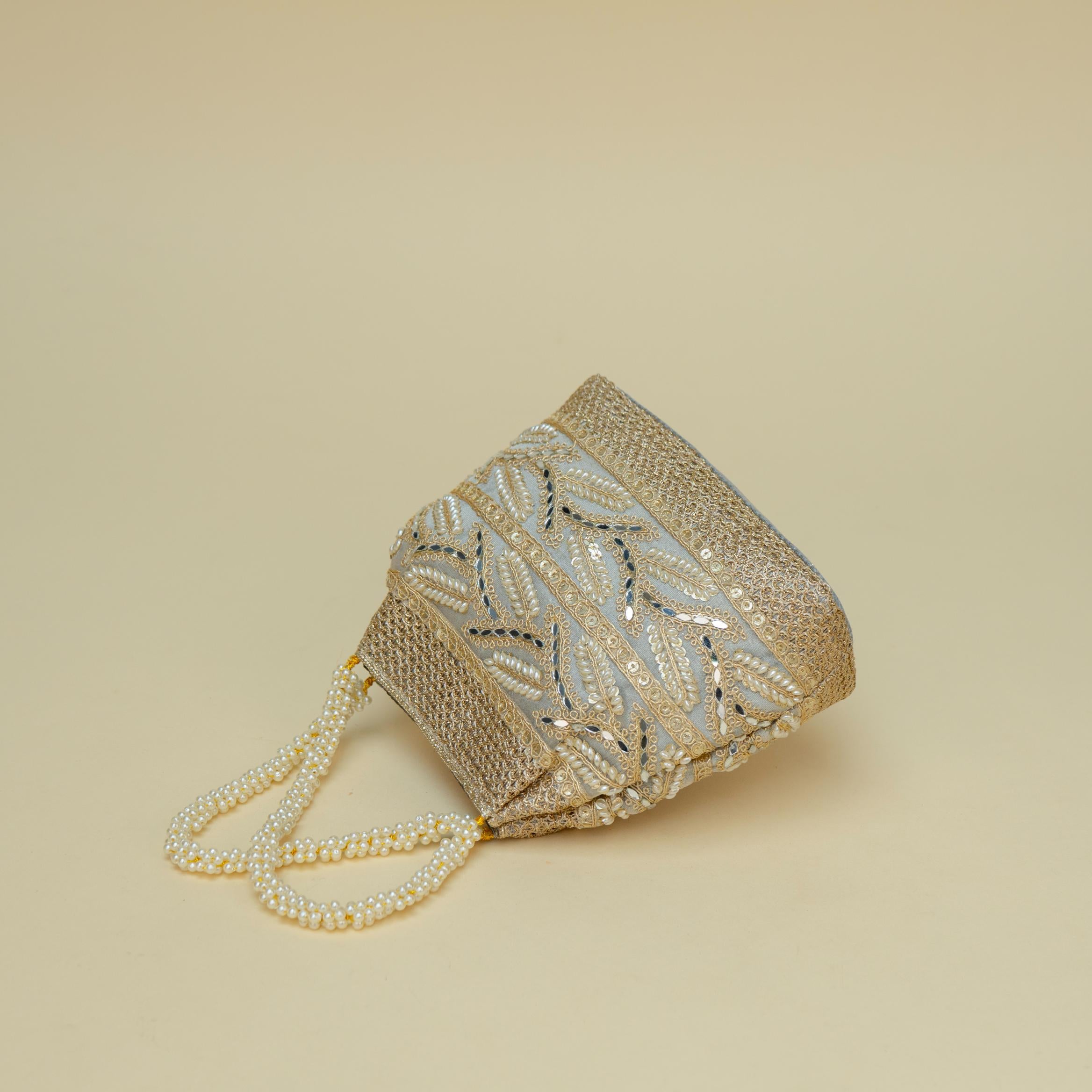 Ornate Handle Potli