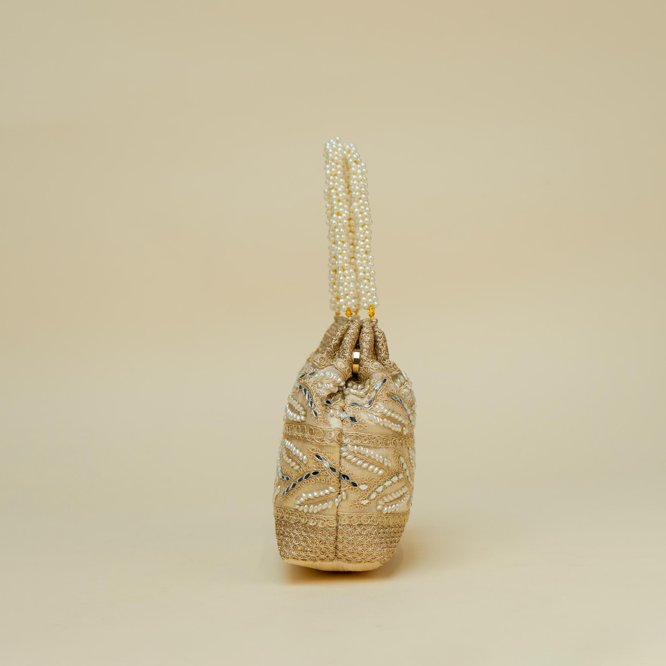 Ornate Handle Potli