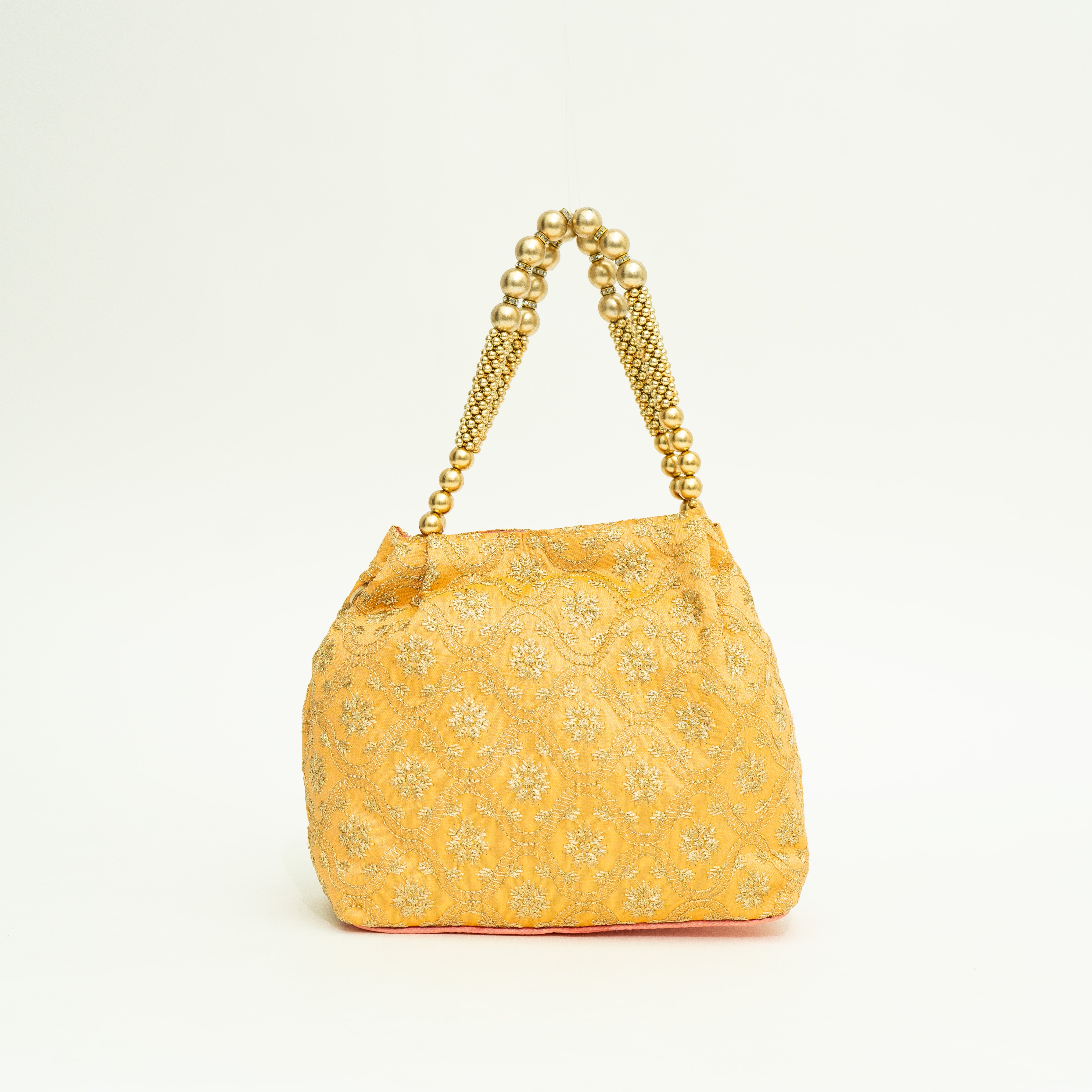 Orange Mystic Midnight Potli | Cara