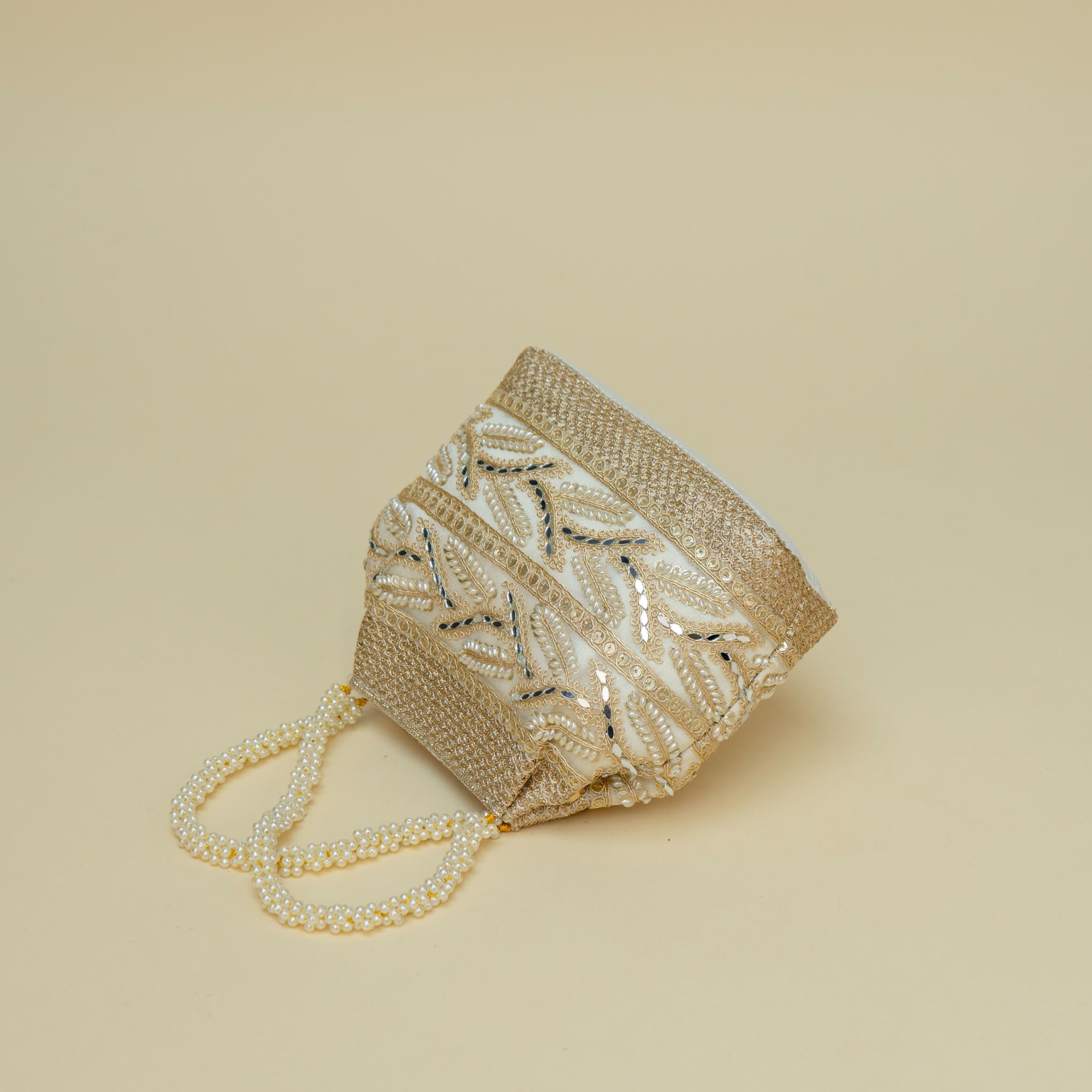 Ornate Handle Potli