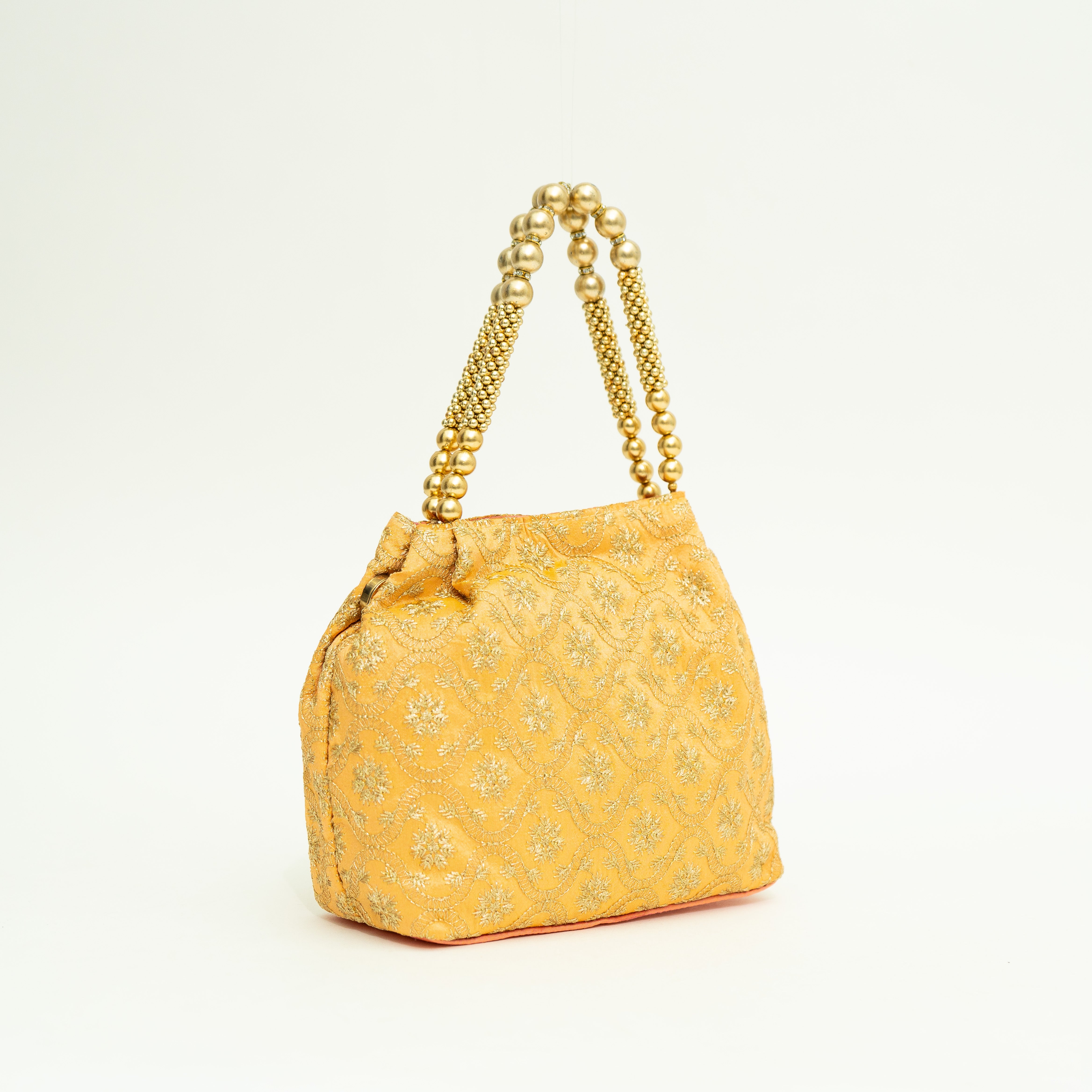 Orange Mystic Midnight Potli | Cara