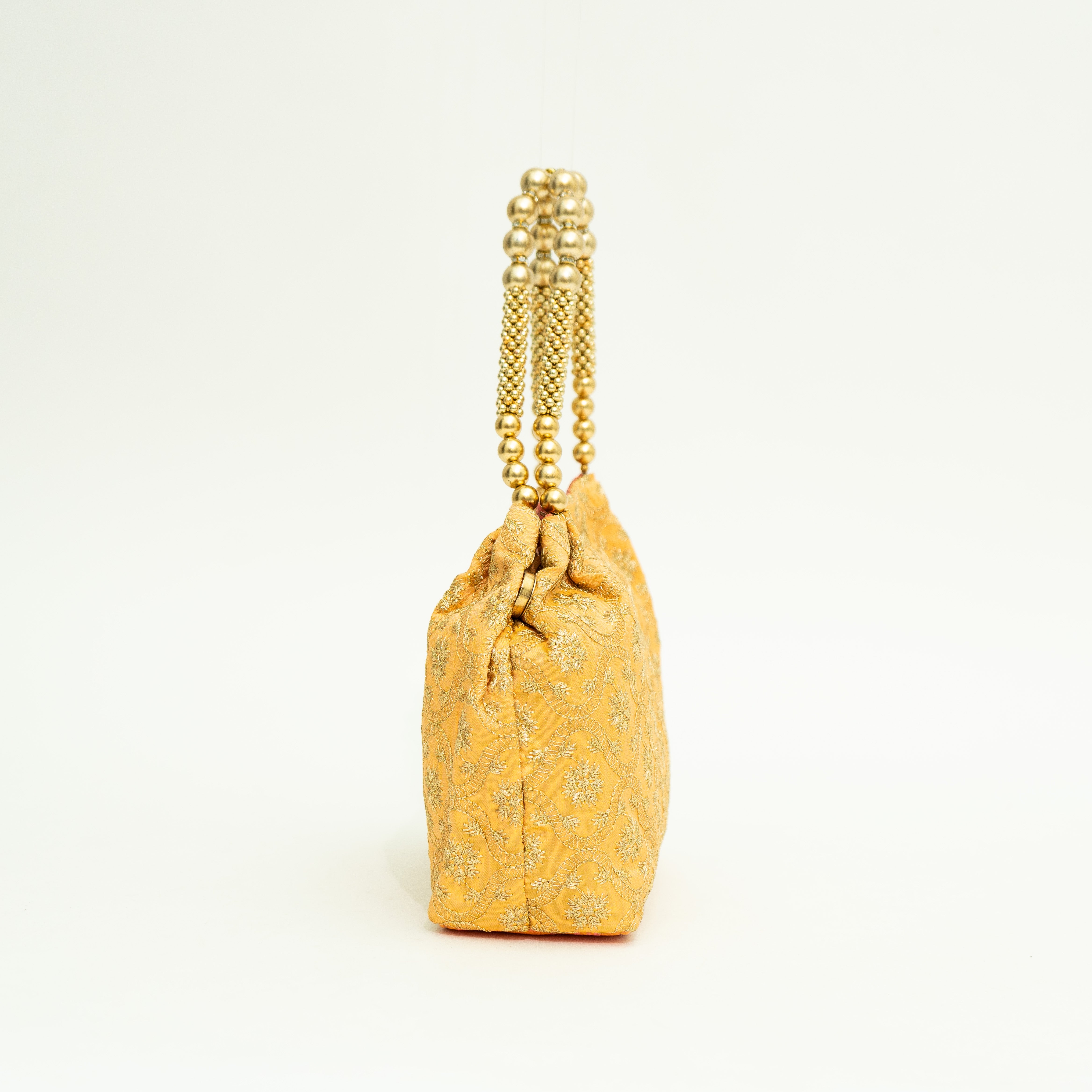 Orange Mystic Midnight Potli | Cara