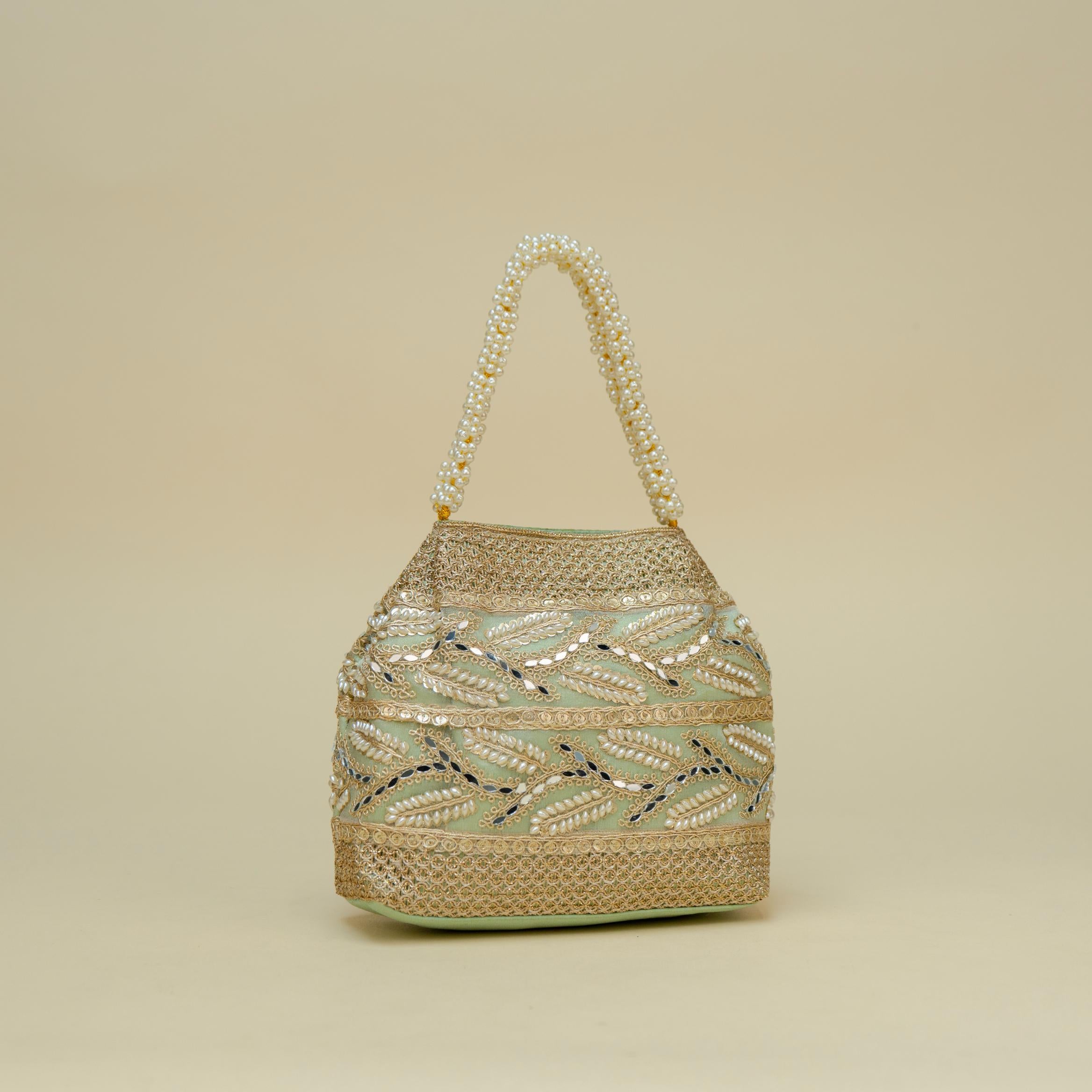 Ornate Handle Potli
