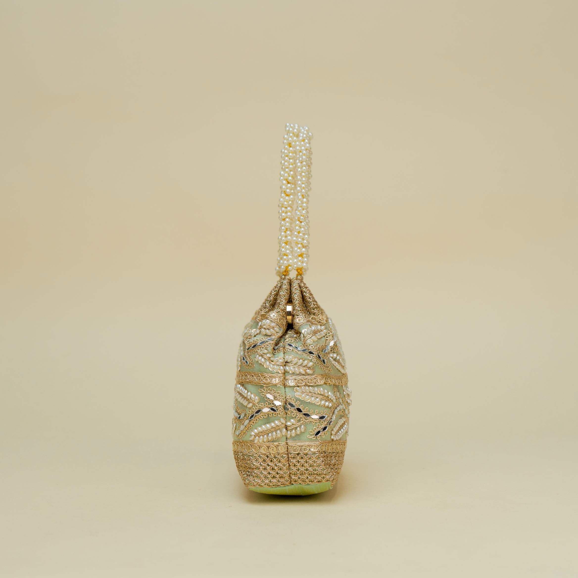 Ornate Handle Potli