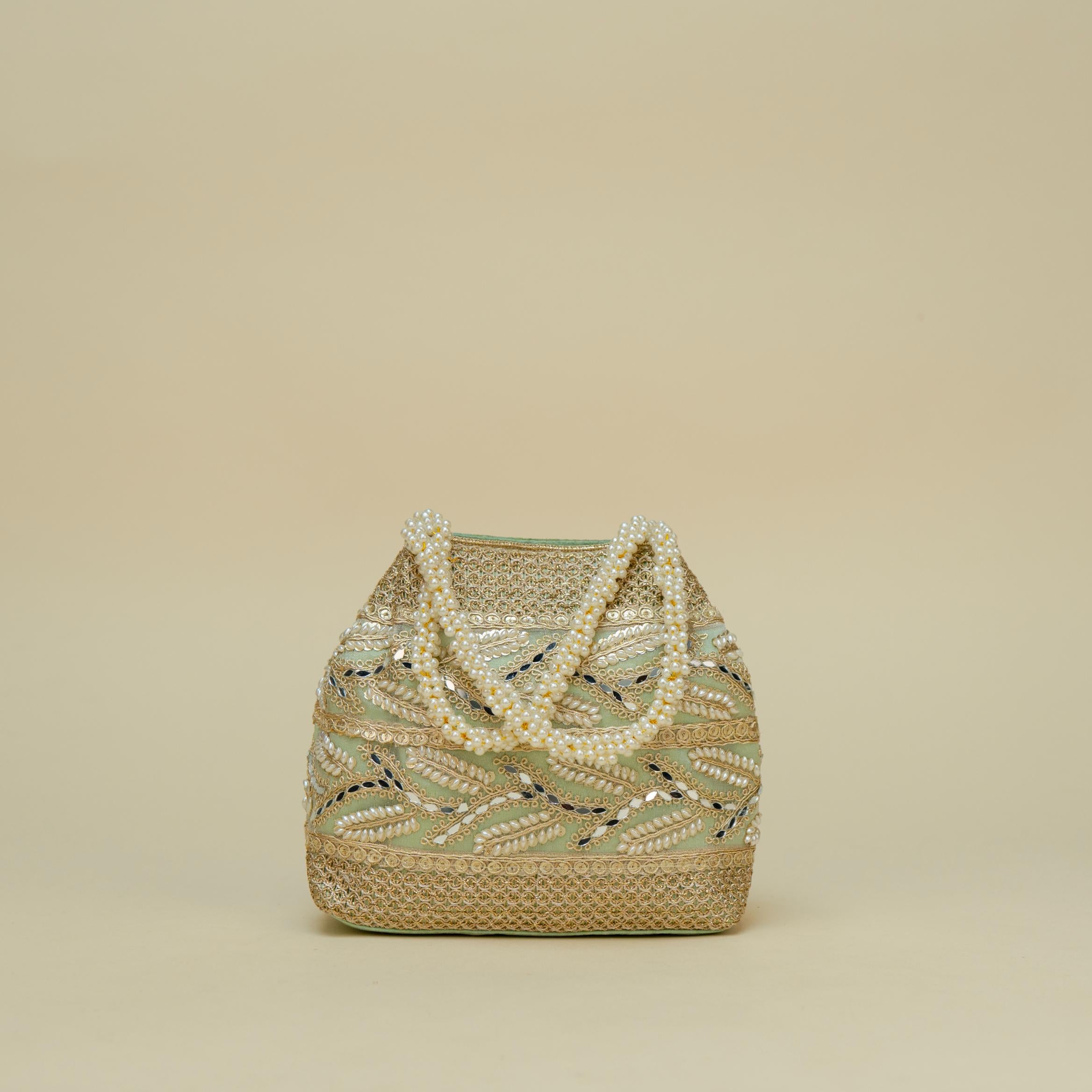 Ornate Handle Potli