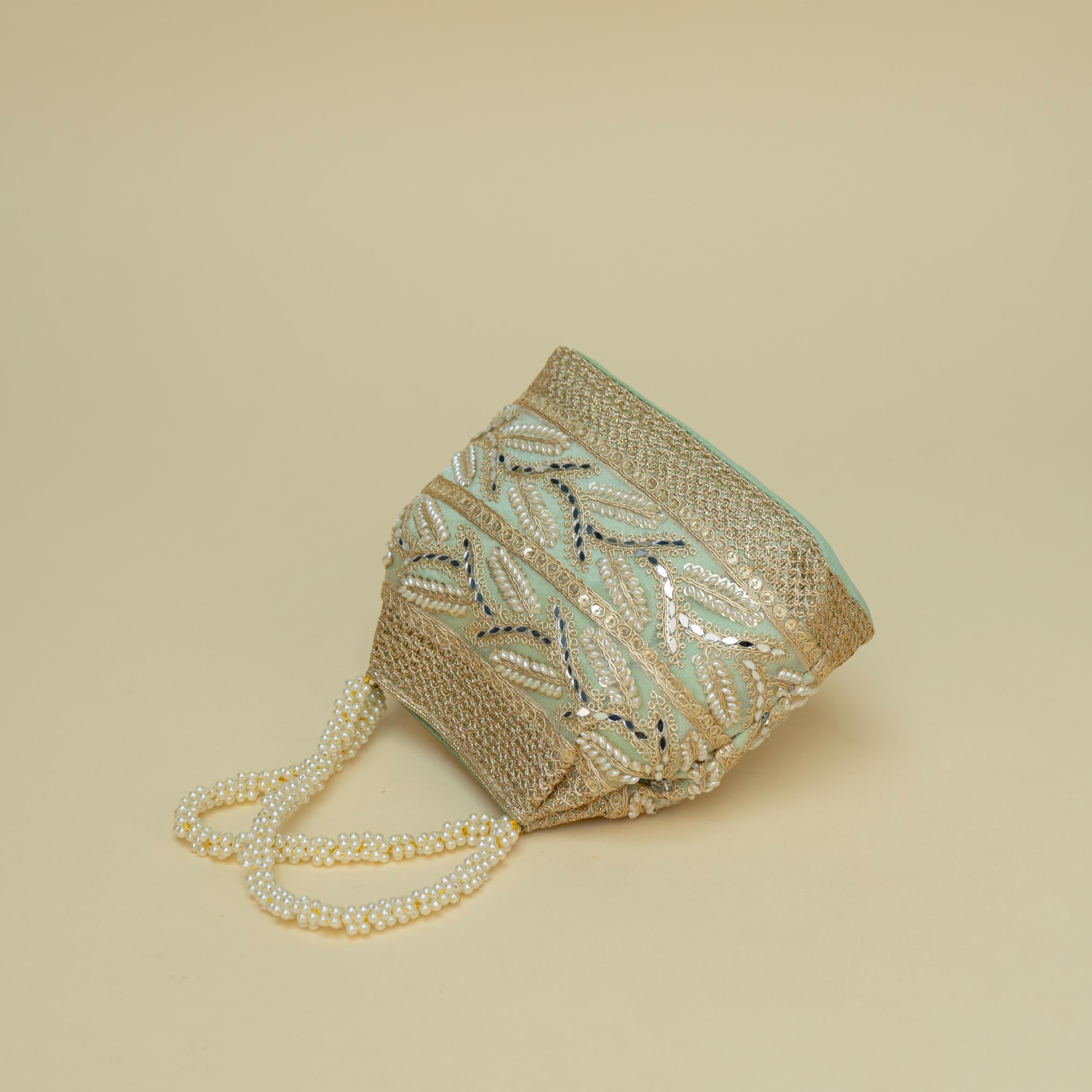 Ornate Handle Potli