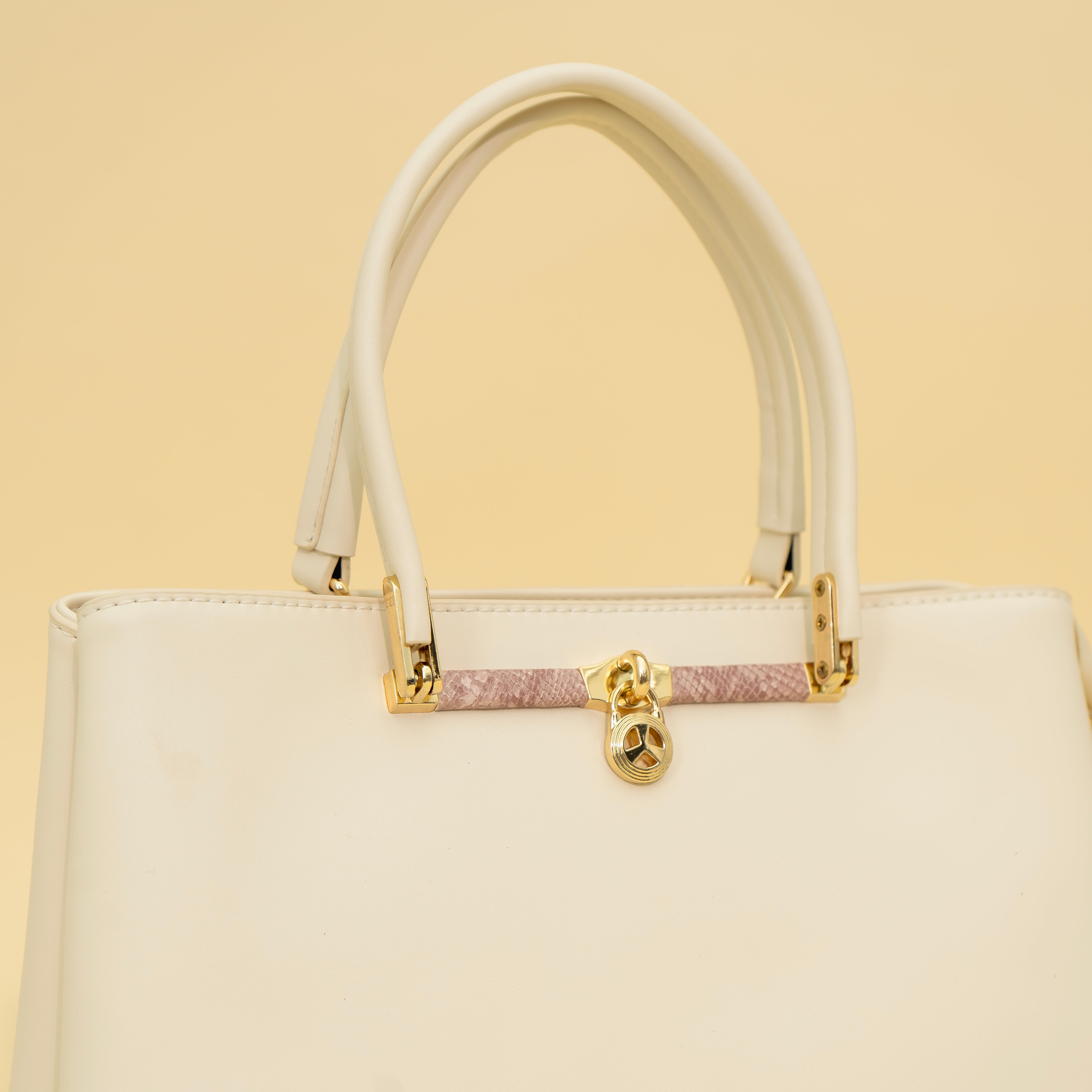 Haute Beige Handbag | CARA