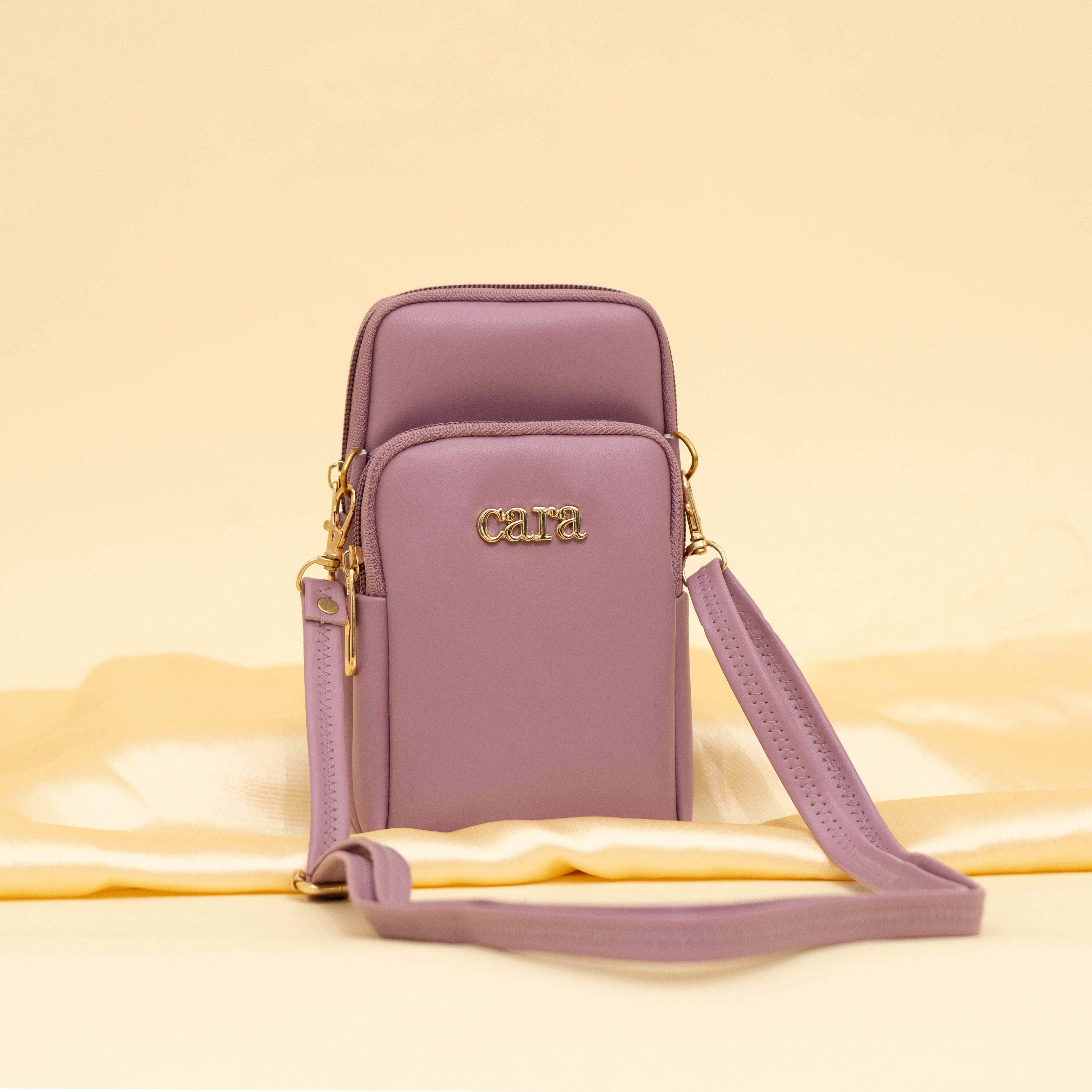 pink Daily Drip mobile sling| cara