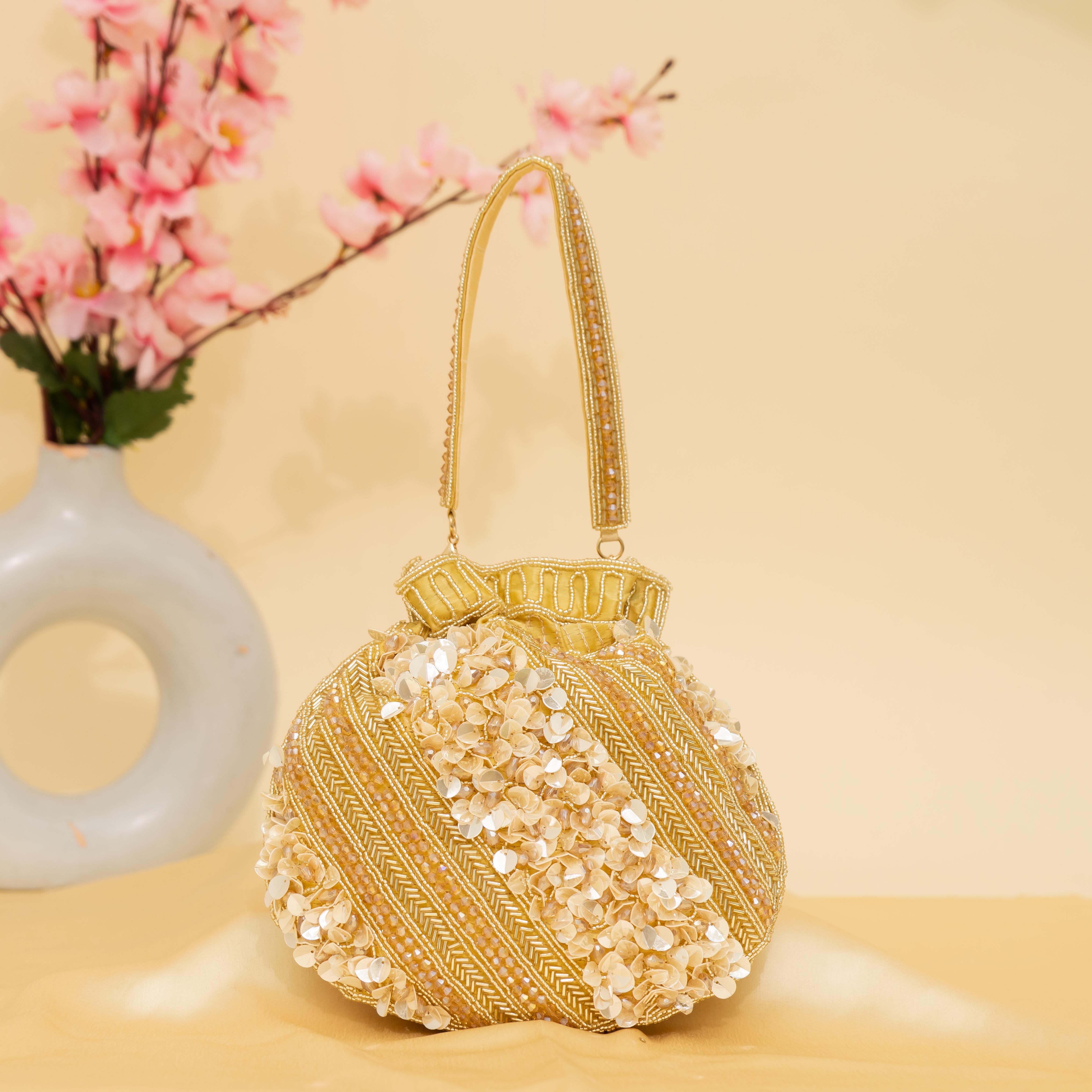 gold Celestial Oyster potli | cara