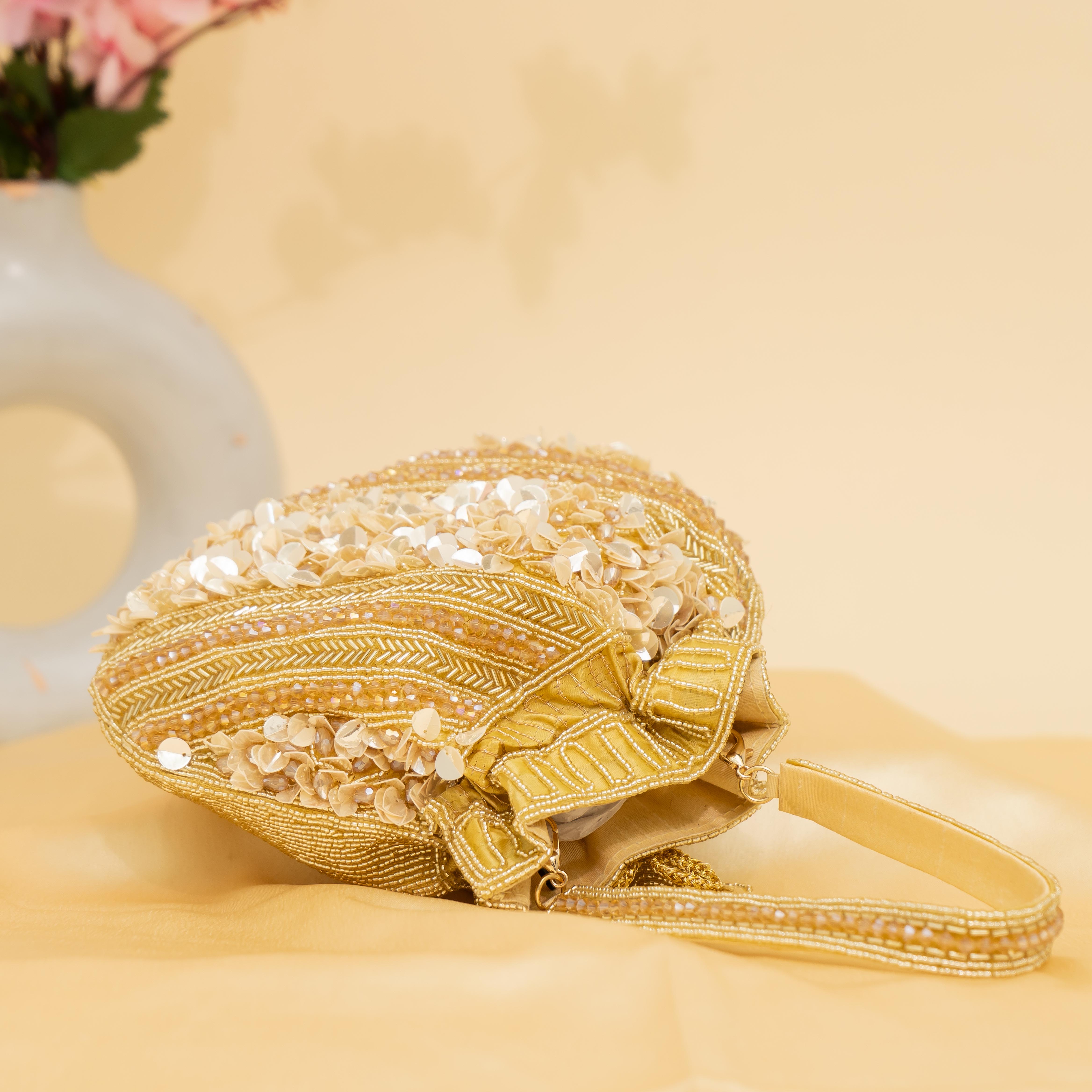 gold Celestial Oyster potli | cara