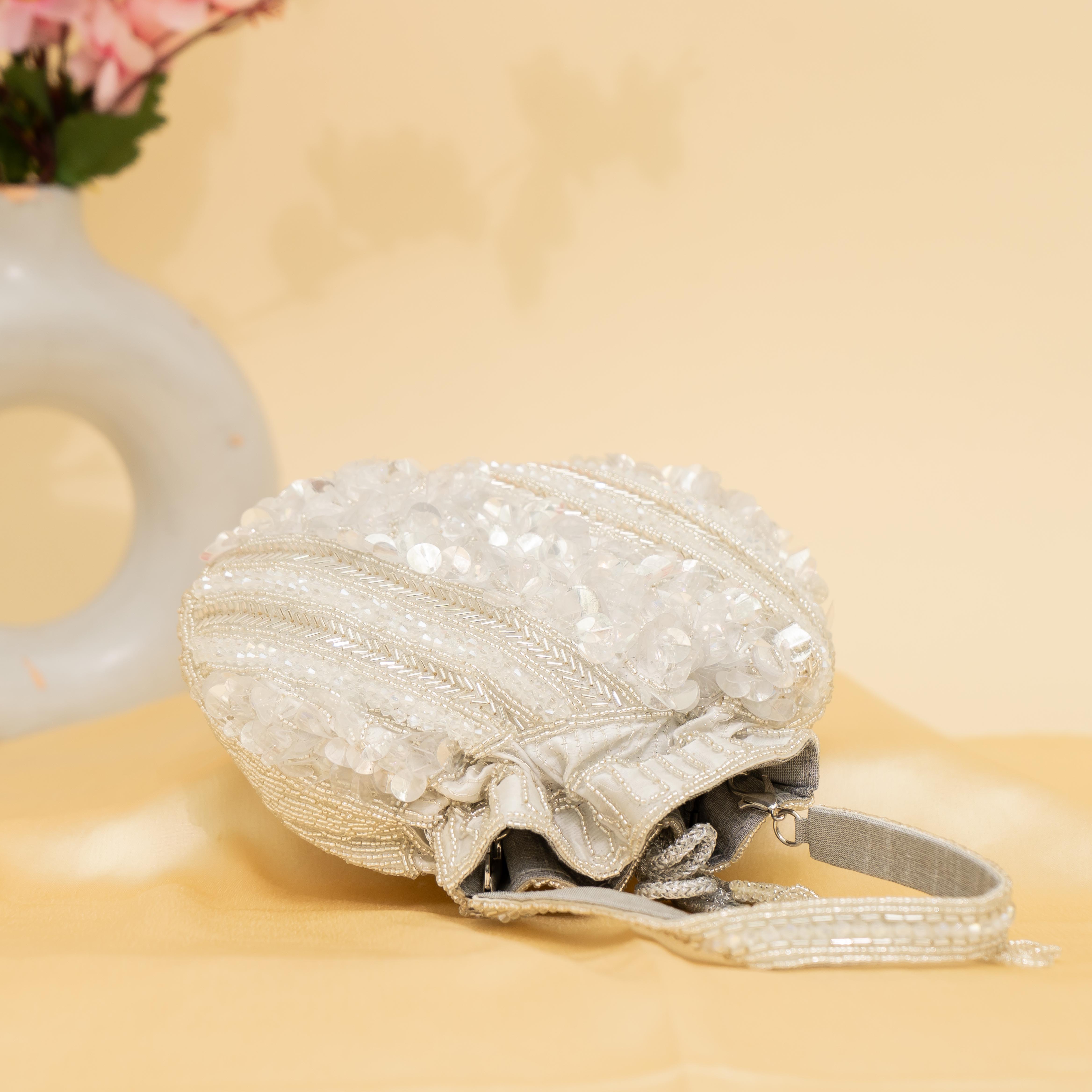 silver Celestial Oyster potli | cara