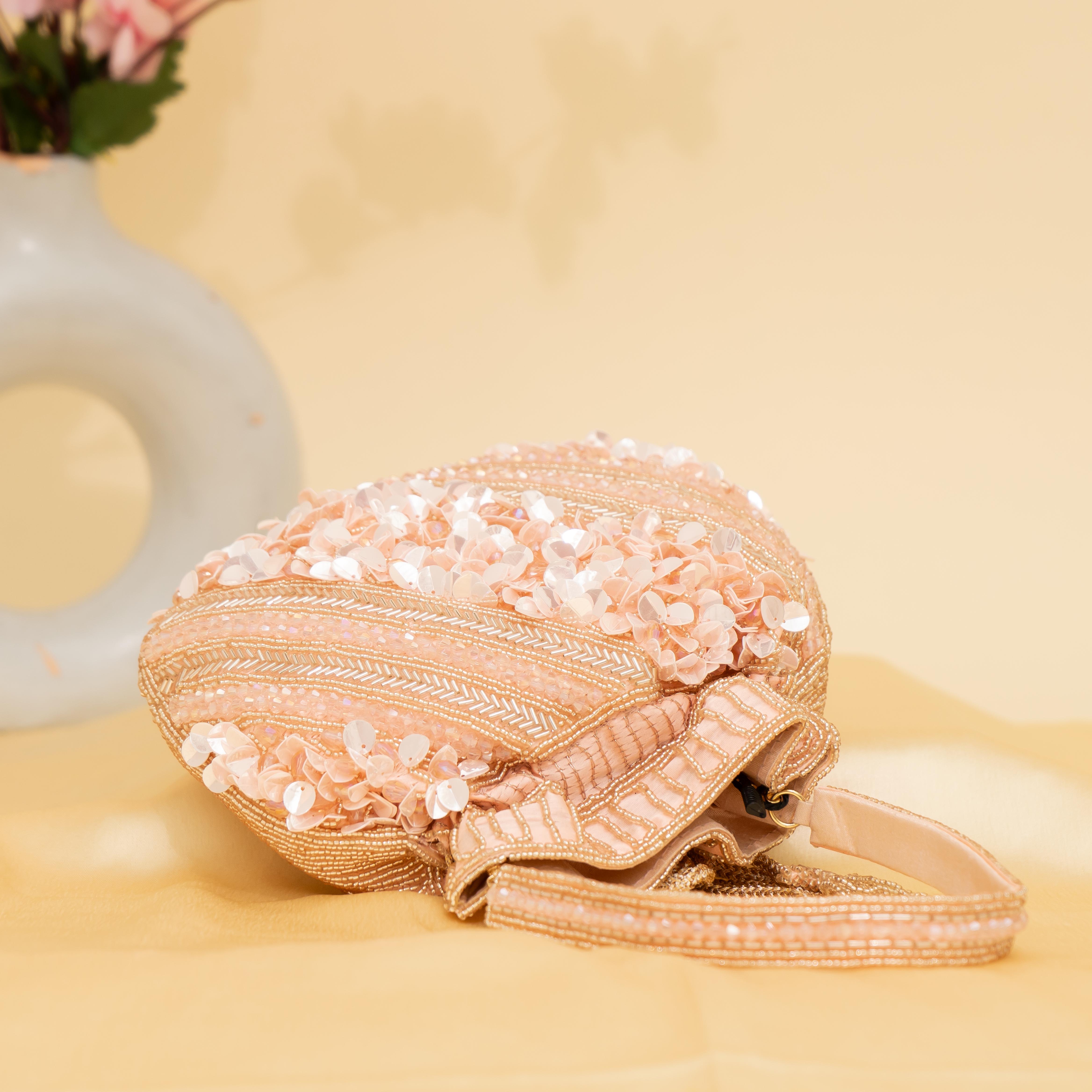 peach Celestial Oyster potli | cara