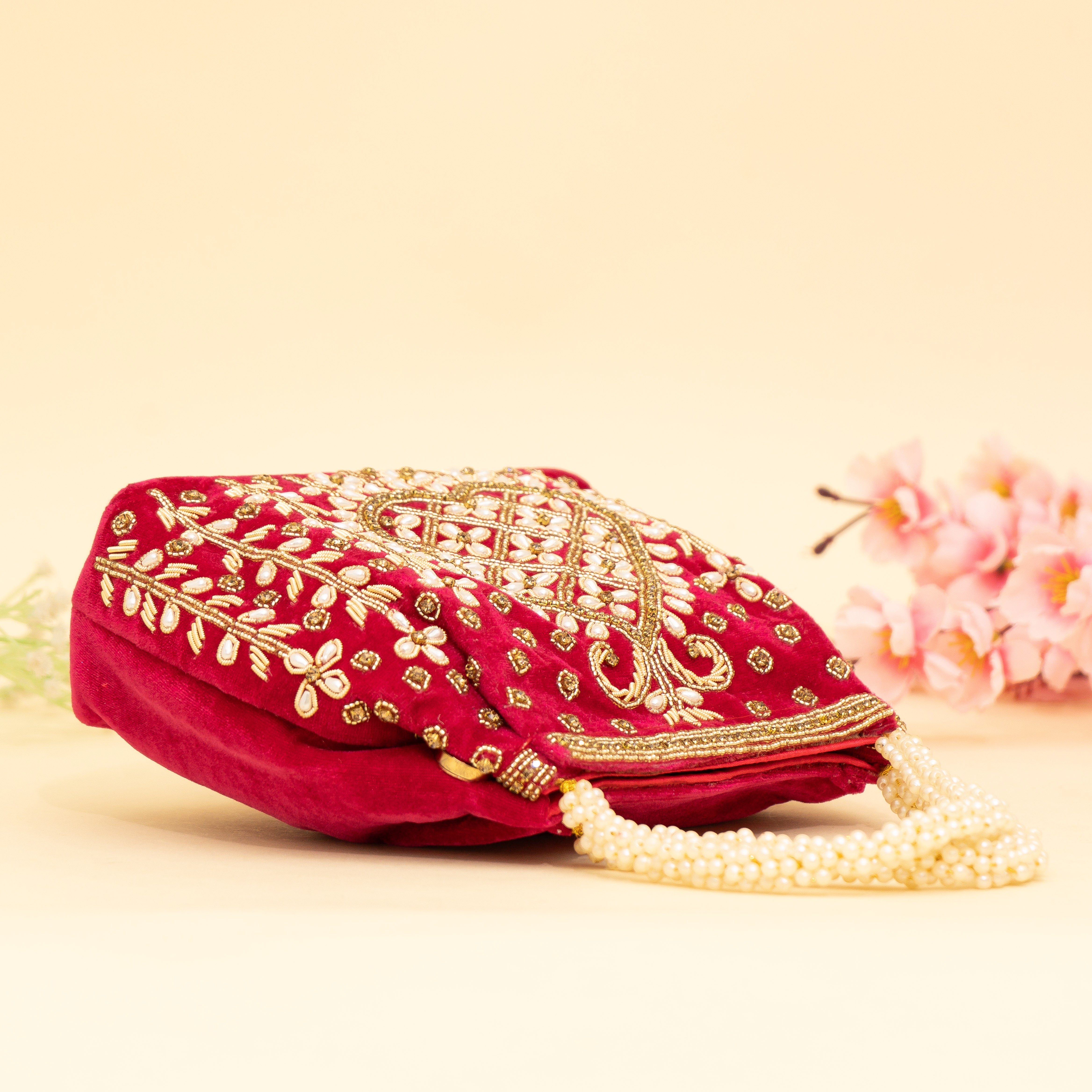 Red Lustrous Pearl Embellish Potli