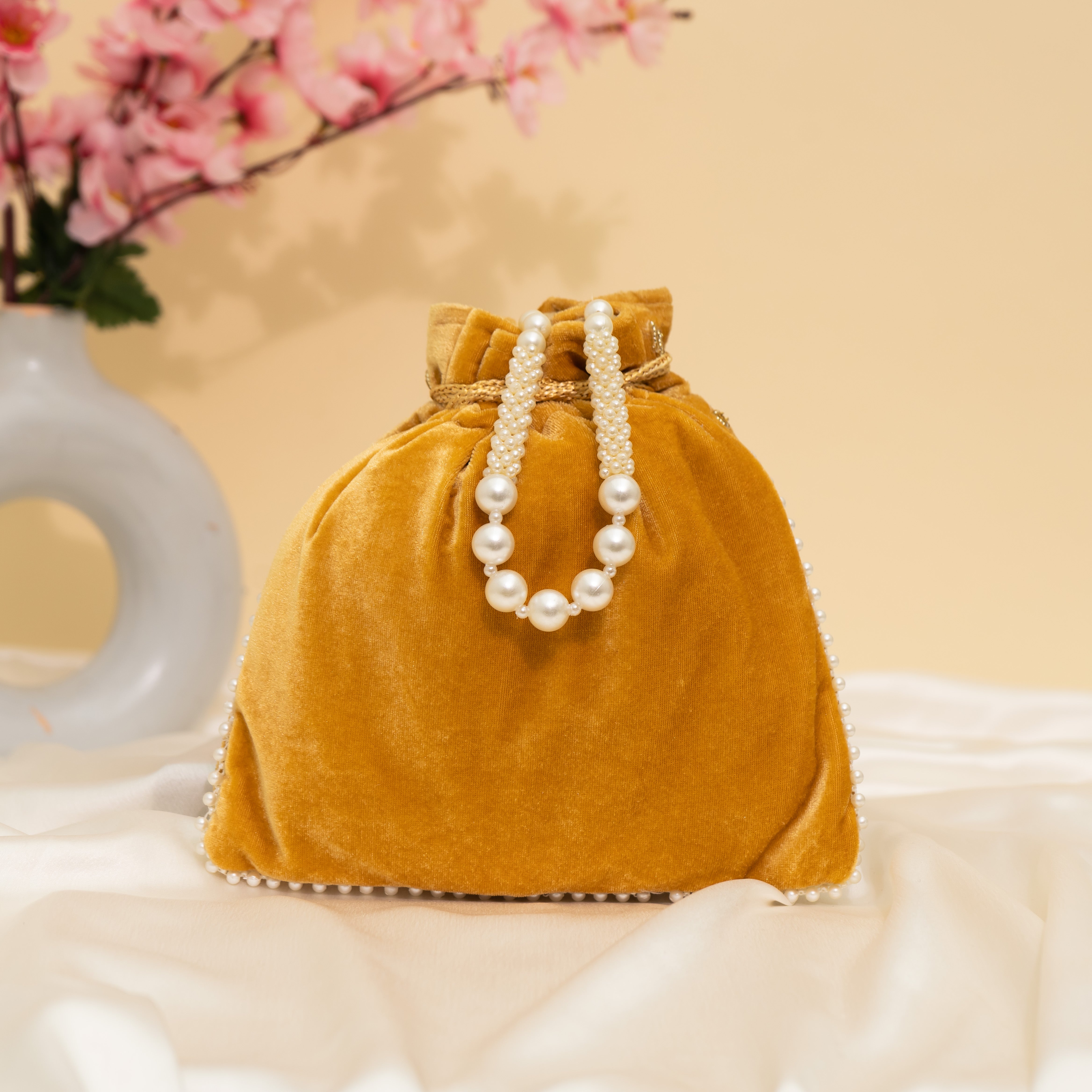 Yellow Pearlstone Radiance Potli