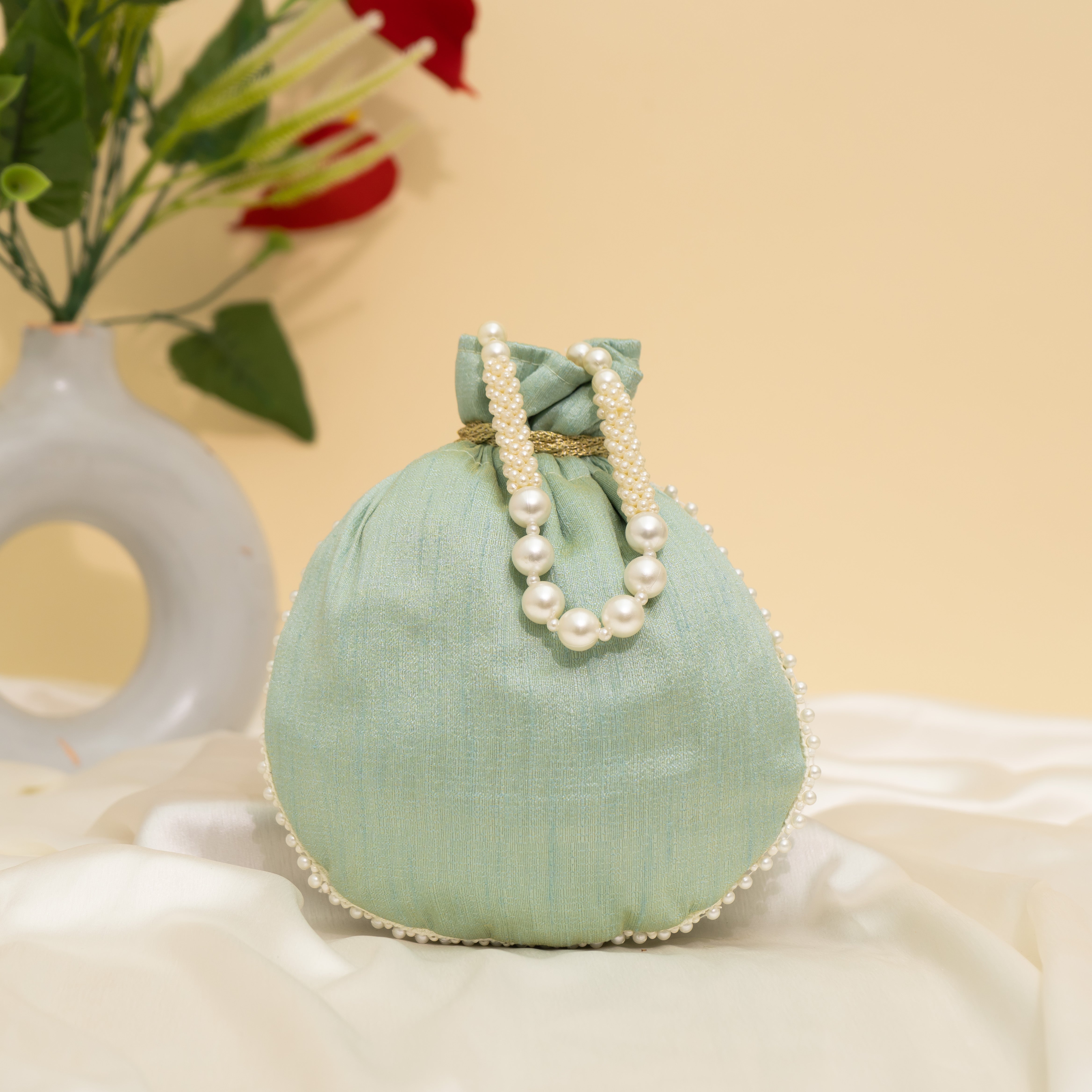 Light Blue Pearl Glow Fantasy Potli
