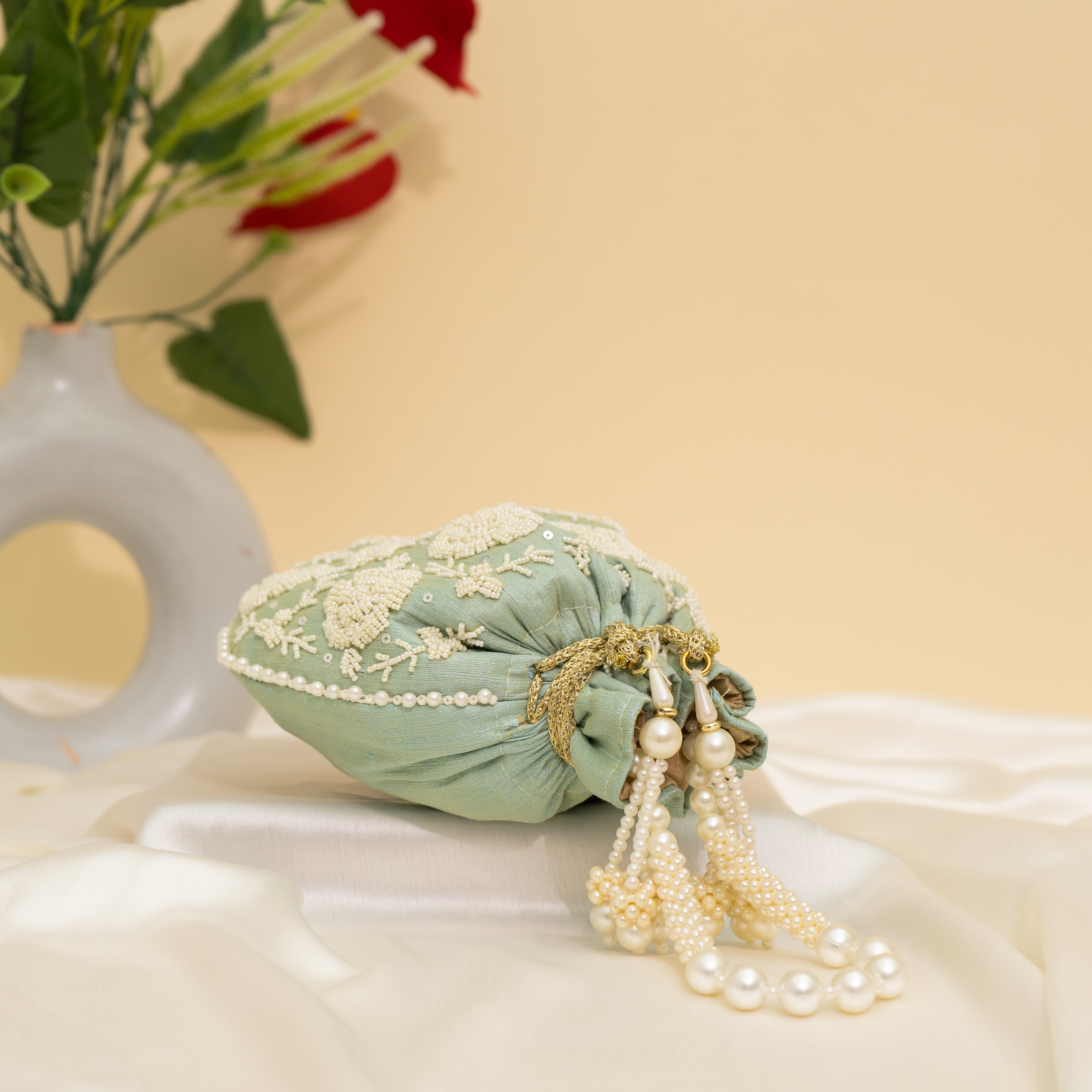 Light Blue Pearl Glow Fantasy Potli