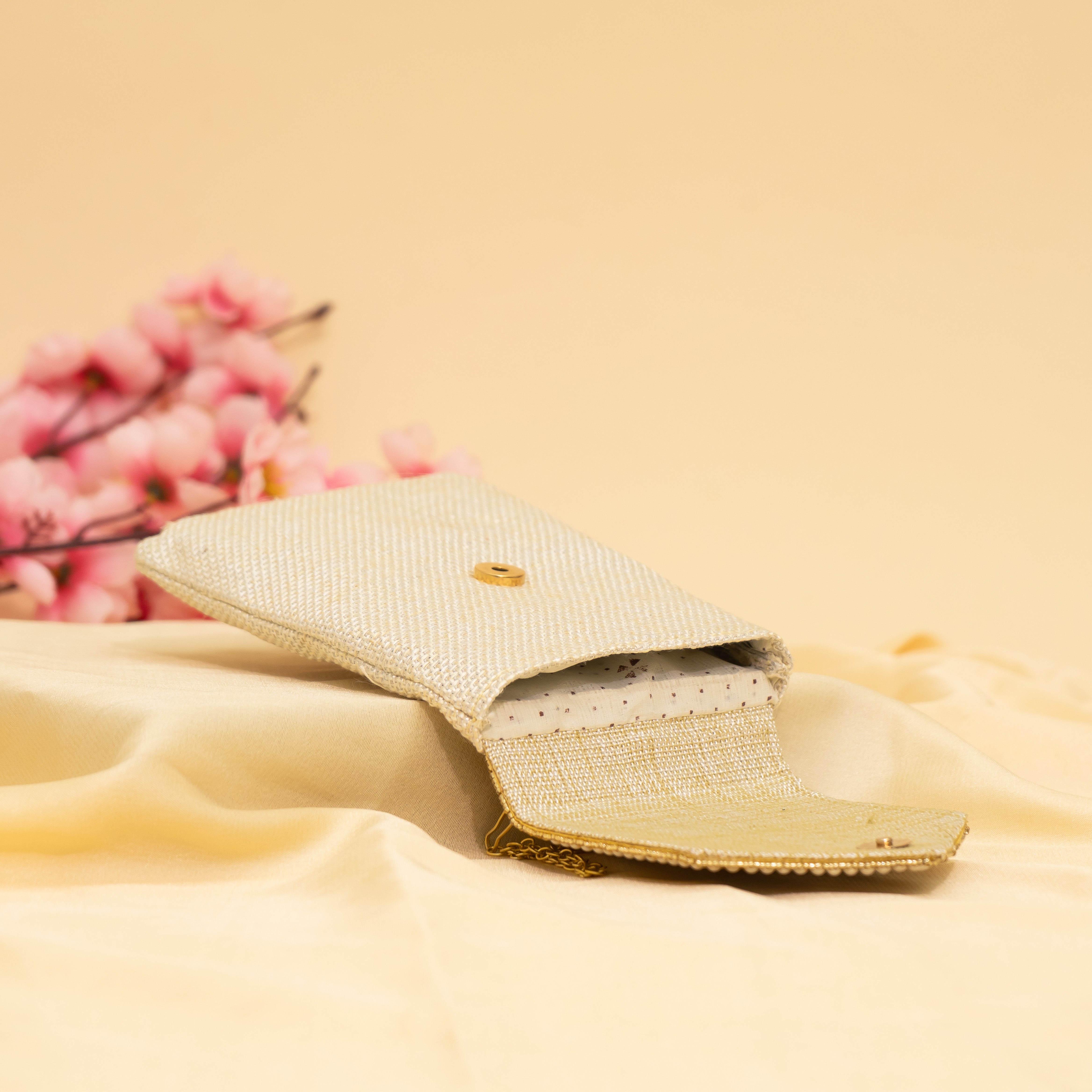 Cream Pearl Drop Mobile Sling