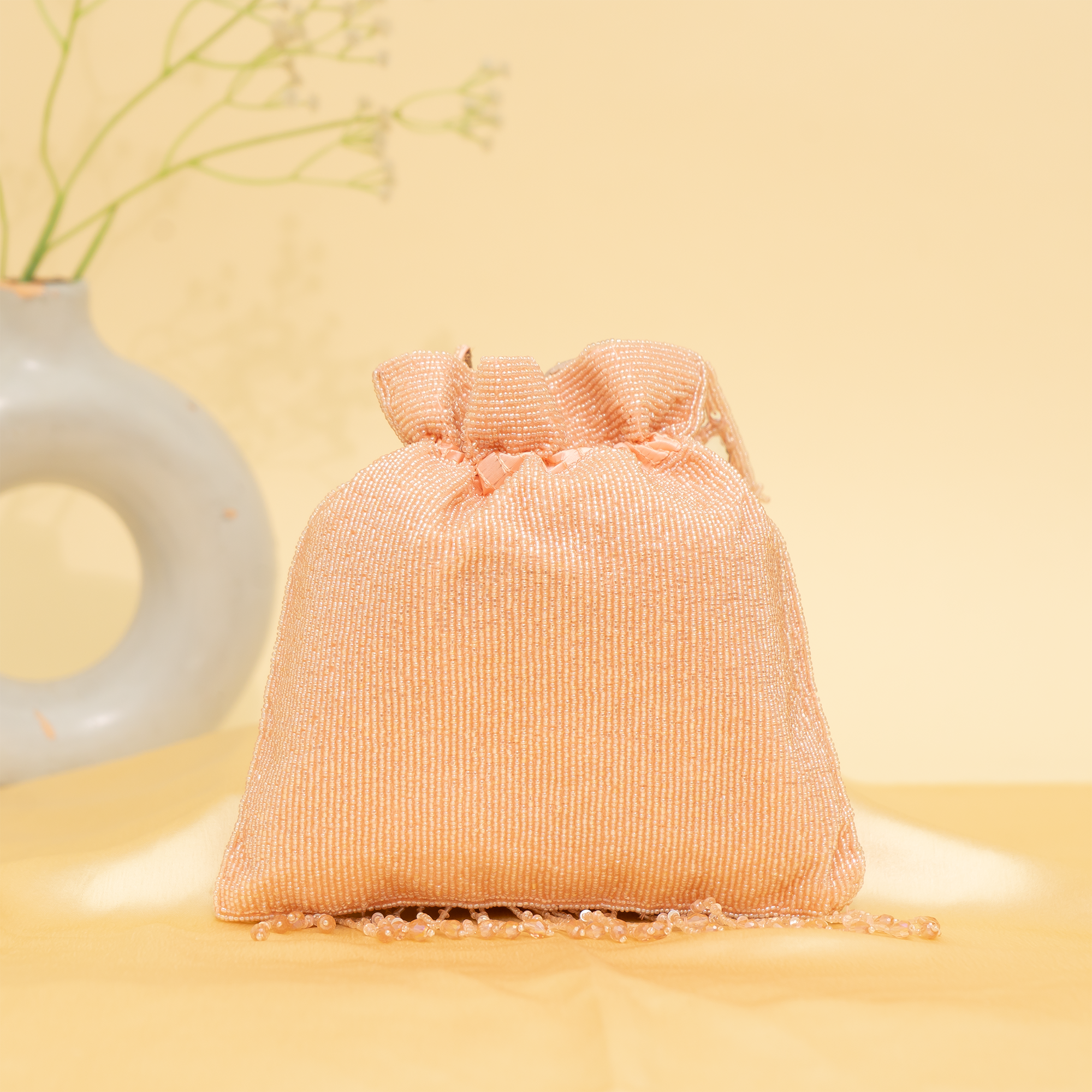 peach Reflective Beads potli| cara