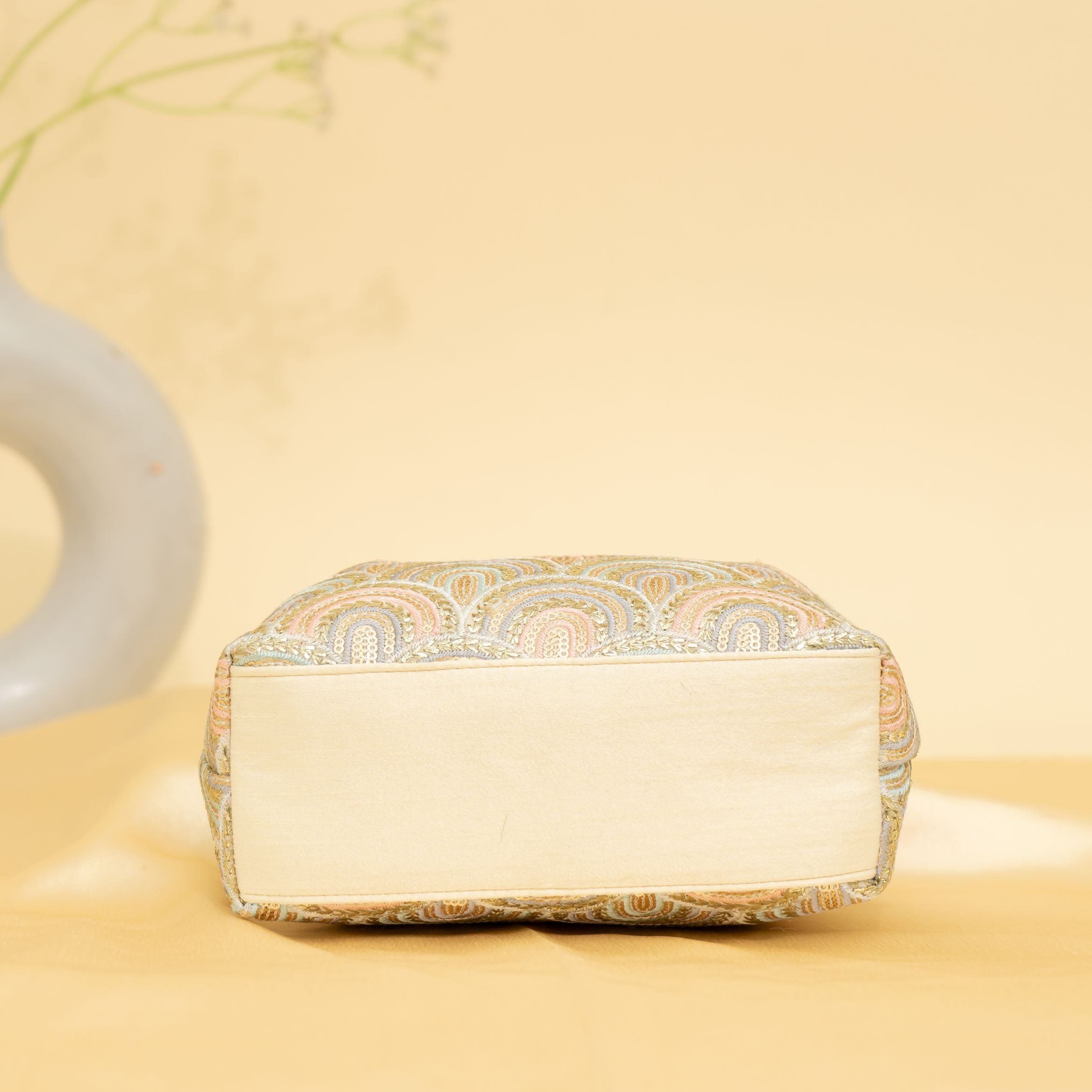 Golden Grace Potli-cream | cara