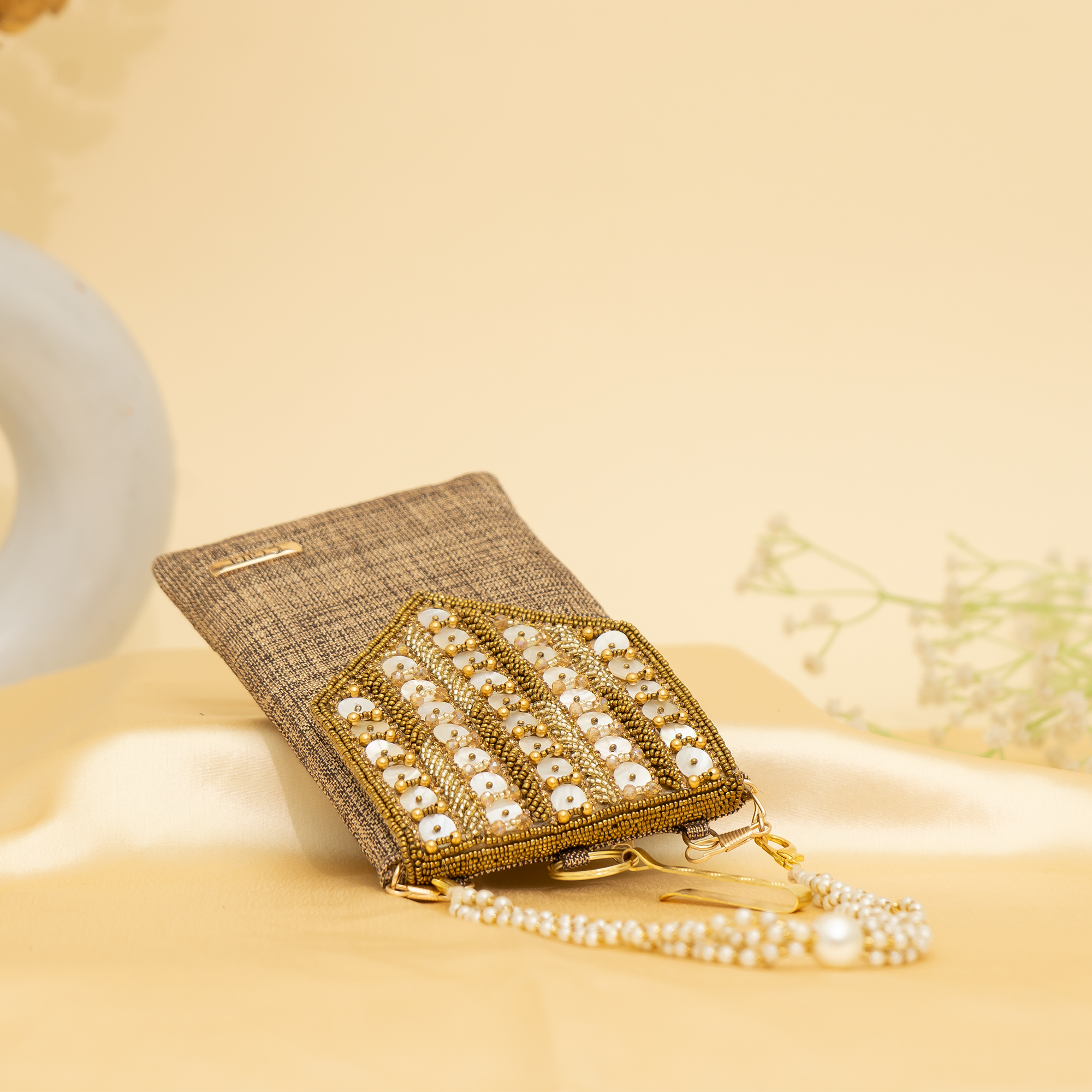 brown Lustrous Charm Designer Mobile sling | cara