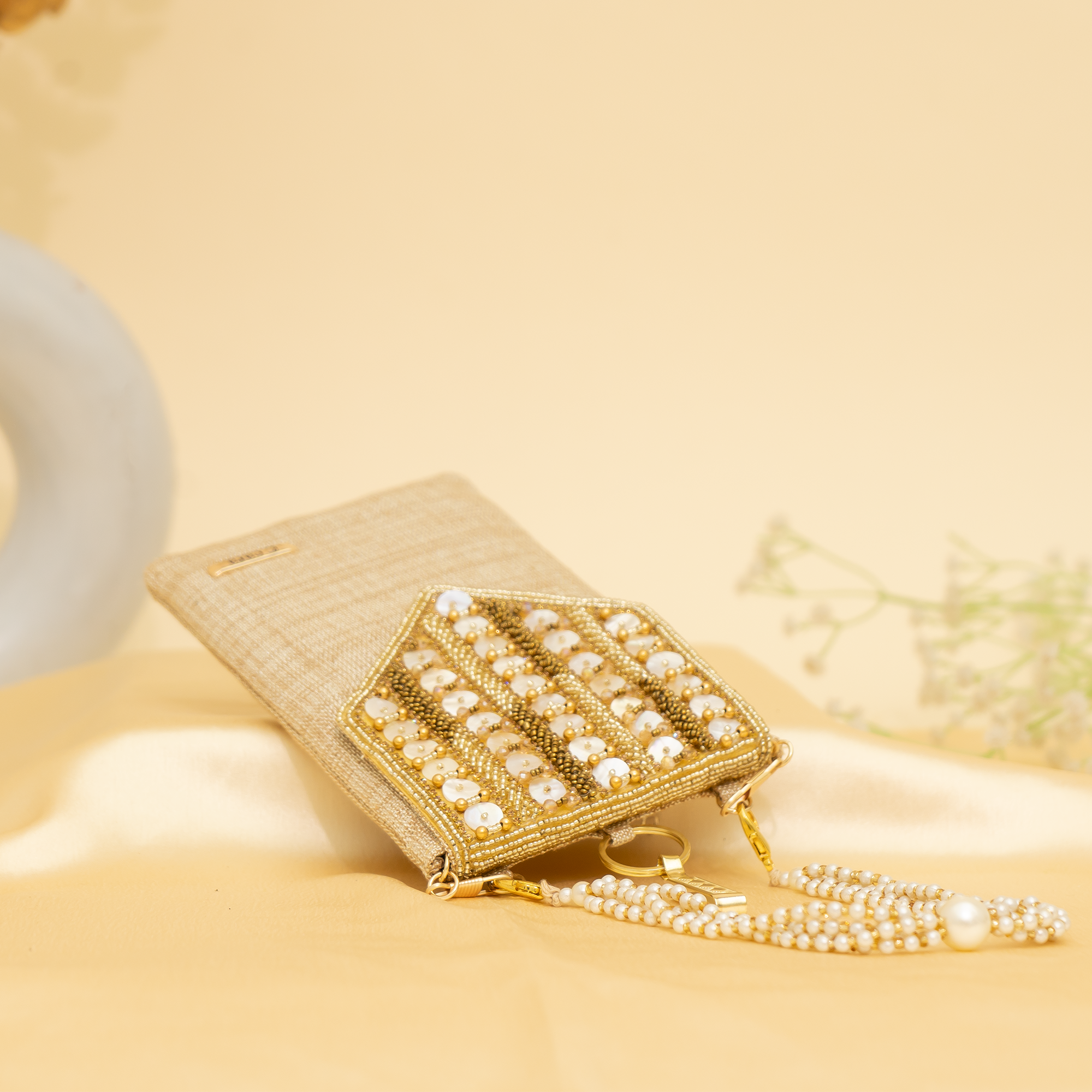gold Lustrous Charm Designer Mobile sling | cara