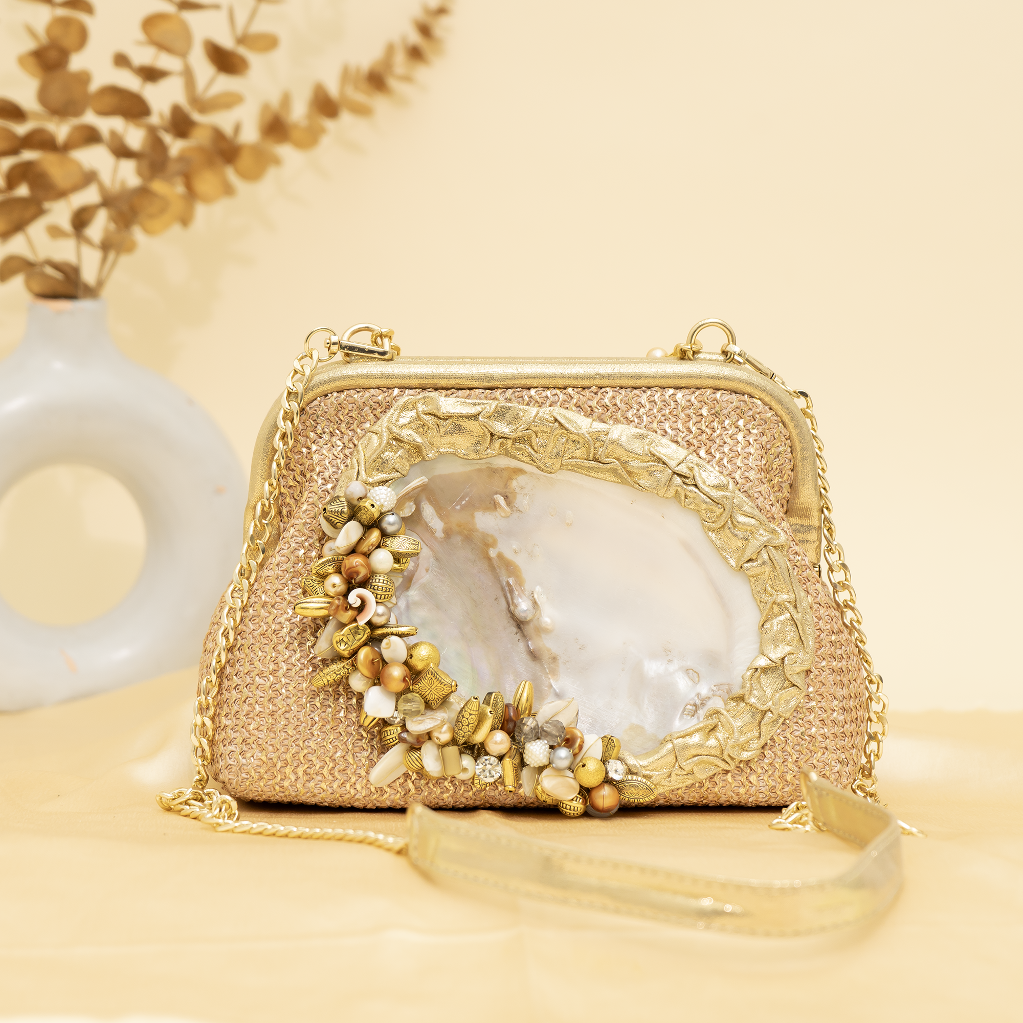 warm gold Empress Shell potli | cara