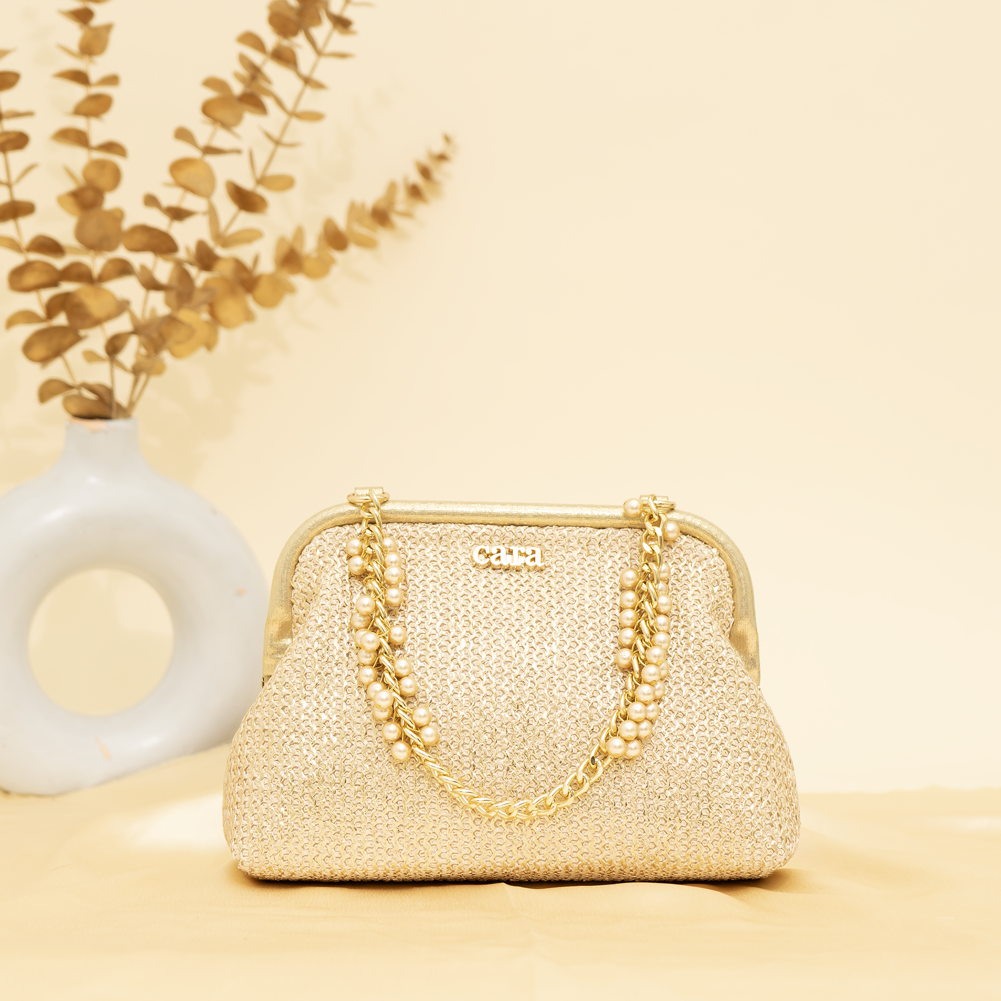 cream Empress Shell potli | cara