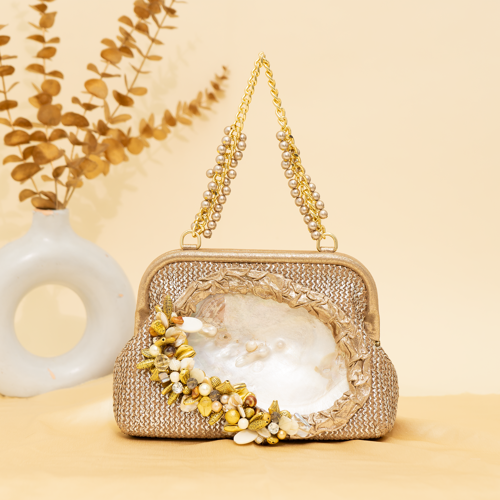 Bronze Empress Shell potli | cara